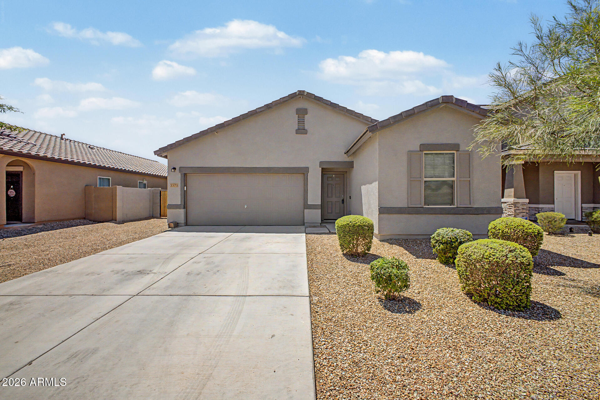 This home has everything you WISH came with new builds- fully finished landscaping in front and back, custom designer paint, EPOXY garage, and RV GATE! The interior showcases bright and spacious living areas ready to bring you joy, featuring high ceilings to enhance the sense of space. The kitchen comes equipped with everything to make home cooking a breeze, including ample cabinets, plenty of counter space, and appliances included. The main bedroom is a true retreat, offering a private bathroom and a walk-in closet for easy organization. The backyard is complete with an extended covered patio perfect for relaxation, and plenty of space for outdoor fun!