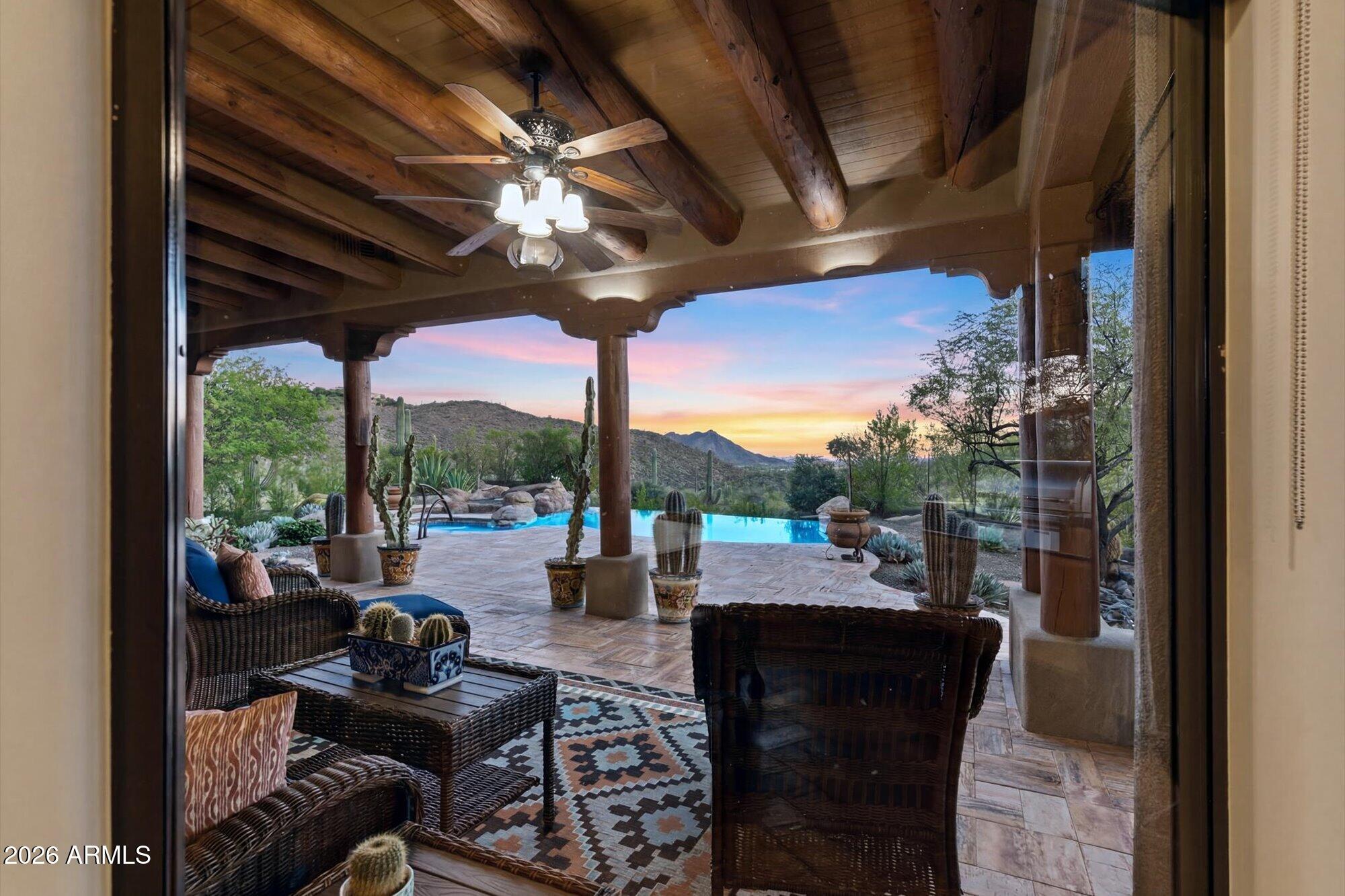 Experience true Arizona living in this impeccably renovated Southwestern-Hacienda retreat located in the desirable scenic Cottonwood Canyon / Sierra Vista desert corridor. Situated to capture sweeping valley views for miles, this home showcases one of the most thoughtful and high-quality transformations on the market today.
Extensively updated throughout, the home features stunning new flooring, a completely reimagined chef's kitchen, beautifully redesigned fireplace, and exceptional indoor-outdoor living spaces with professionally crafted front and rear hardscapes. Every detail has been carefully curated, blending authentic Southwest character with elevated modern finishes and timeless design. The open floor plan flows effortlessly for both entertaining and everyday living, while expansive windows frame breathtaking desert and mountain views from multiple vantage points throughout the home.
The outdoor spaces are equally impressive, offering privacy, tranquility, and unforgettable sunsets in a setting that truly embraces the Cave Creek lifestyle.
This is easily one of the cleanest, most well-executed homes to hit the market--an exceptional opportunity for buyers seeking quality, style, and unforgettable Arizona views.The furniture in this home may be available.