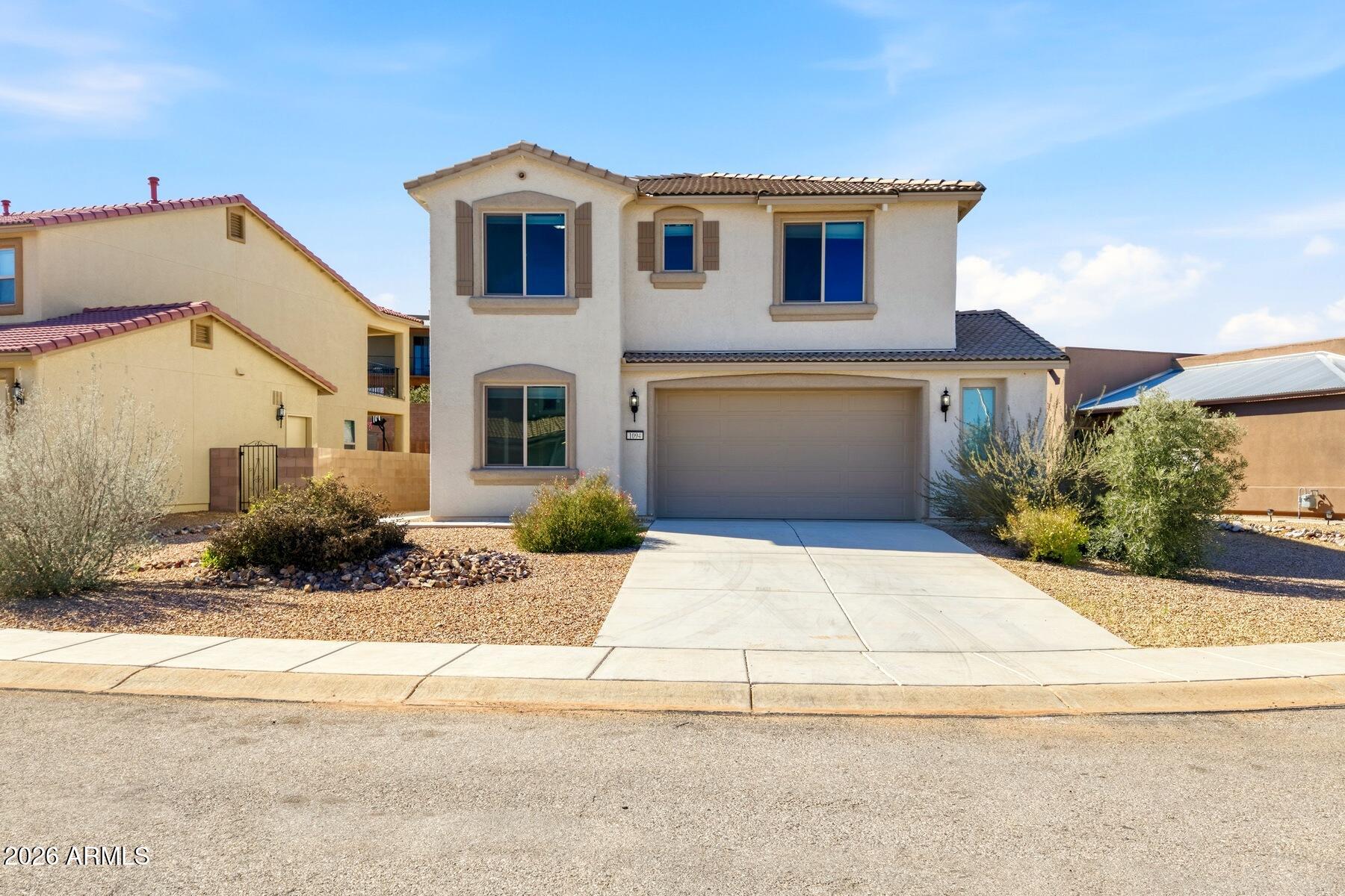 2021 built RL Workman home close to Ft. Huachuca and amenities! 2,694 sq ft open concept 4 bedroom, 3 bath home that includes a loft area, 1st floor bedroom and full bath, 2-car garage with 5' expansion & pedestrian door. Upgraded grey painted cabinets with granite countertops throughout! Kitchen has large island, 36'' uppers, walk-in pantry, stainless appliances, and tile backsplash. Master suite has large walk-in closet, & covered balcony! Upgraded carpet and pad in bedrooms, loft, and stairs with wood-look tile throughout the rest of the home. Washer and Dryer included. Energy Star Certification and Environments for Living Guarantee.