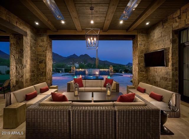 Gorgeous Ranch Hacienda Home in the Horseshoe Canyon with mountain and city light views with incredible outdoor living.