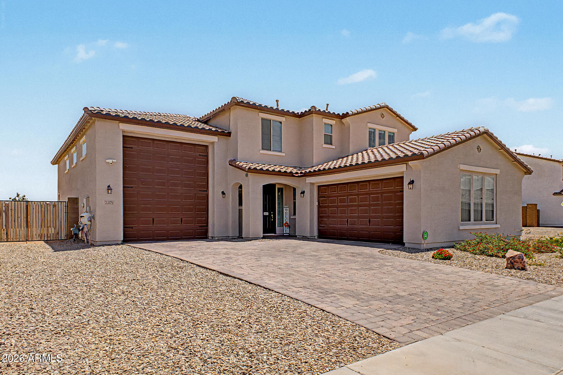 Looking for a home with space for all your toys? This 4-bedroom, 3-bath home offers 2,640 sq. ft., an RV garage, a 2-car garage, and a double gate--perfect for extra vehicles, trailers, or outdoor gear. Inside, enjoy a well-appointed kitchen with quartz countertops, 42'' upper cabinets, and a walk-in pantry. The open great room and dining area flow to center-meet doors and a peaceful covered patio. A main-floor bedroom and full bath add flexibility, while the upstairs loft, secondary bedrooms with walk-in closets, and spacious owner's suite with private bath and large walk-in closet complete this beautiful home. Don't miss out on this fantastic opportunity!