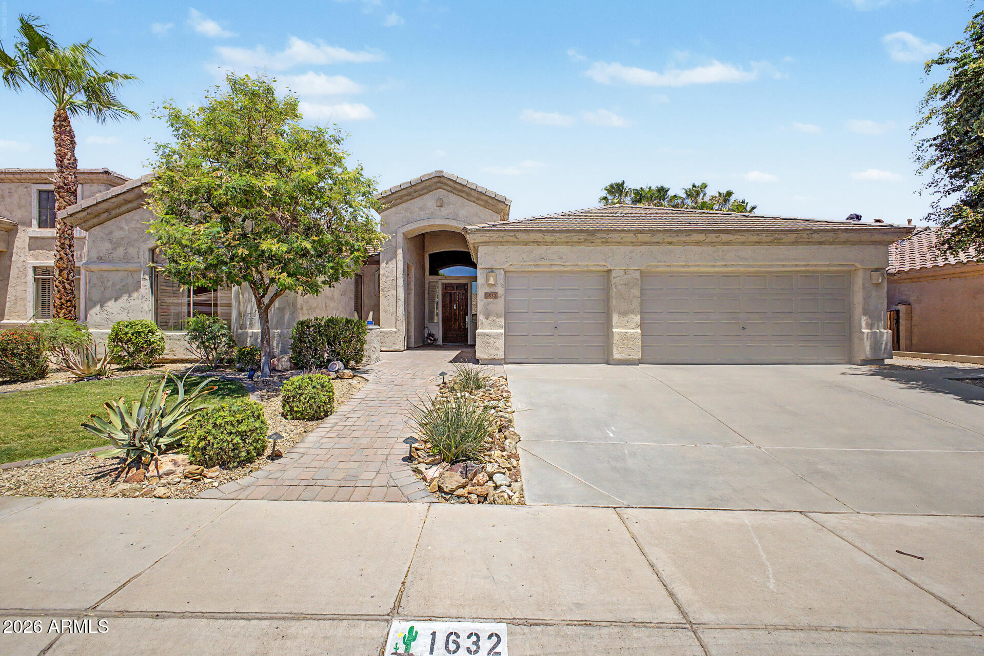 Rarely do homes this lovely and well maintained become available in highly desirable Club West in the Ahwatukee Foothills. This stylish Southwestern single level home blends perfectly into the popular desert neighborhood of Palisades located only a few minutes from the hiking and biking heaven called South Mountain Park. The residence is incredibly energy efficient featuring an OWNED solar energy system that greatly reduces the cost of electricity. As you enter this residence, you'll be struck by the soaring ceilings, attractive split floor plan and upgraded fixtures. The primary suite and bath offer a soaking tub, a spa like shower, dual vanities and a large walk in closet. The guest bath has been upgraded with a curbless shower and dual vanities. The gourmet kitchen revolves around the enormous island, featuring natural stone surfaces. The backyard features a sparkling pool and large covered, misted patio seating area perfect for entertaining. You'll also find a grapefruit tree, lemon tree and orange trees. There is ample storage throughout the home including a three car garage. Easy access to the 202 freeway makes commuting to downtown Phoenix or Sky Harbor Airport a breeze while the community is both serene and peaceful. The home is located in the highly regarded Kyrene School District. There is a true sense of pride of ownership as the seller has been diligent and proactive with maintenance of the property.