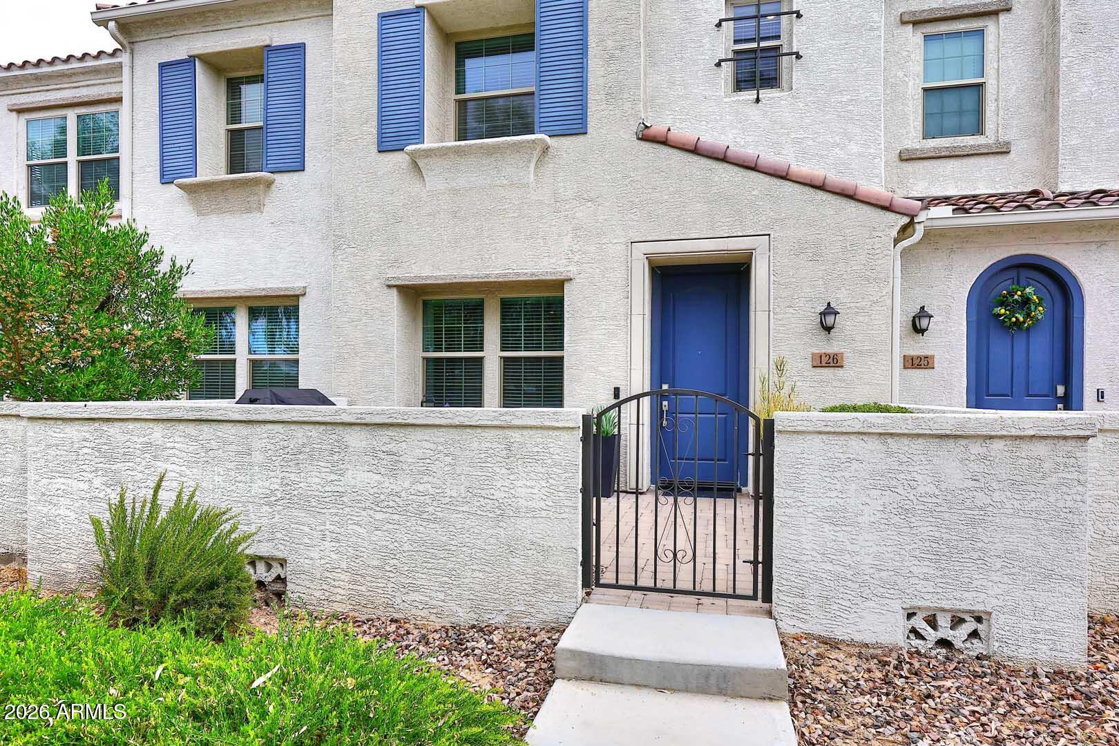 Stunning townhome located in Chandler's highly sought-after gated community of Echelon at Ocotillo. Beautifully maintained, this home provides an elevated, low-maintenance lifestyle featuring a gourmet kitchen with quartz countertops, stainless steel appliances, gas range and a large island. The spacious great room is perfect for entertaining, while the private courtyard offers the ideal space to relax and unwind. Upstairs features a split floor plan with a spacious primary ensuite with a custom linen closet, along with two additional bedrooms, a loft, and a convenient laundry room with built-in cabinets. The 2-car garage includes an EV charging station, epoxy flooring, and a rare full-length driveway. Enjoy all the amenities of resort-style living.