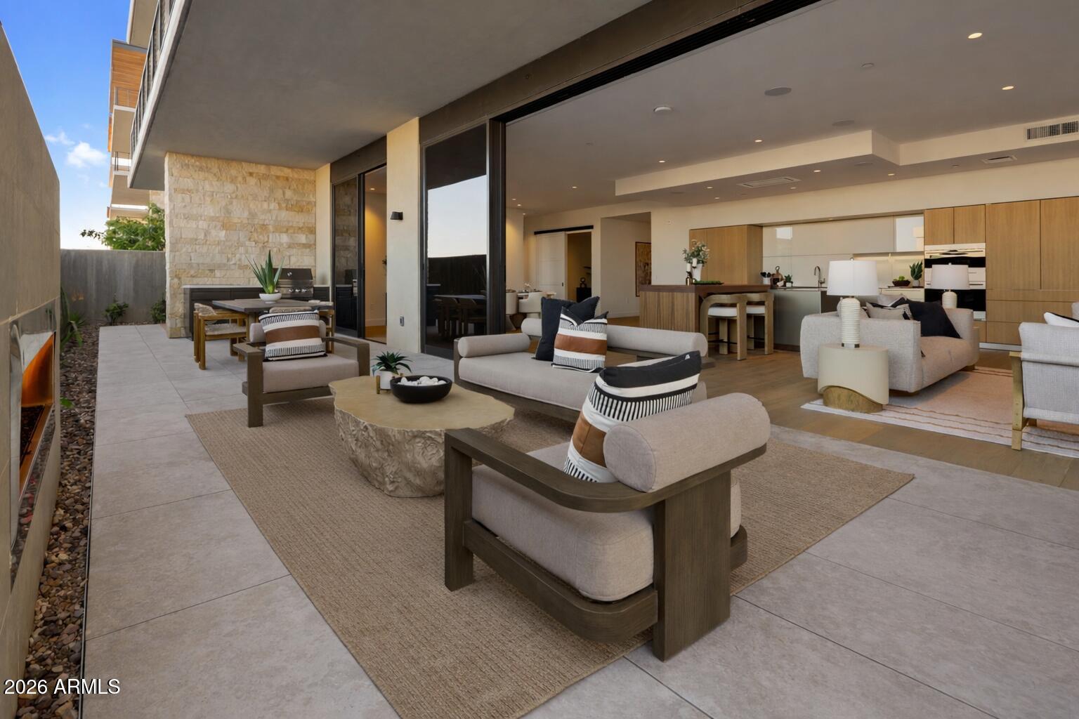 Welcome to Ascent at The Phoenician, where elevated design meets exceptional indoor-outdoor living. This contemporary residence features warm natural finishes and expansive glass, but the true centerpiece is the rare 2,100 sq ft wraparound terrace. One of the largest at the Camelback Residences and designed as a private outdoor living retreat. With three distinct seating areas, a dedicated dining space & a built-in BBQ, the terrace creates an extraordinary setting for entertaining and enjoying Arizona's year-round outdoor lifestyle.
Inside, the home showcases an upgraded bulthaup kitchen, Sub-Zero & Wolf appliances, wide-plank wood flooring, and thoughtfully curated lighting & fixtures. Residents enjoy exclusive access to The Mountain Club, an owners-only amenity with Pool, Gym & Lounge.