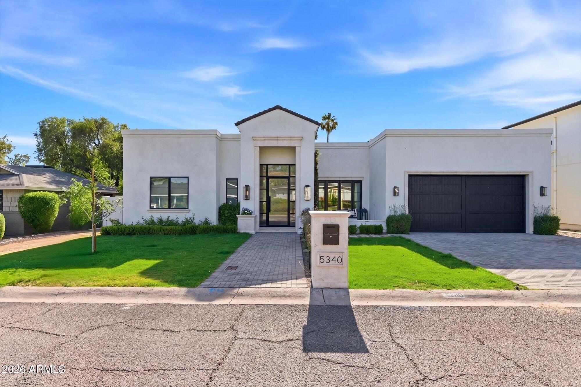 Absolutely beautiful newly built 4-bedroom, 4.5-bath home in highly desirable Biltmore Heights, located in the heart of the Camelback Corridor. This bright and inviting residence features soaring ceilings, wood flooring, crown molding, and designer finishes throughout. The gourmet chef's kitchen offers stunning countertops and cabinetry, a Viking range, paneled built-in refrigerator and freezer, and a spacious walk-in butler's pantry. Every room blends luxury, comfort, and thoughtful design. Enjoy close proximity to Biltmore Fashion Park, Piestewa Peak, premier shopping, hiking, entertainment, and some of the Valley's finest restaurants. A brand-new pool and professionally designed landscaping will be completed soon.