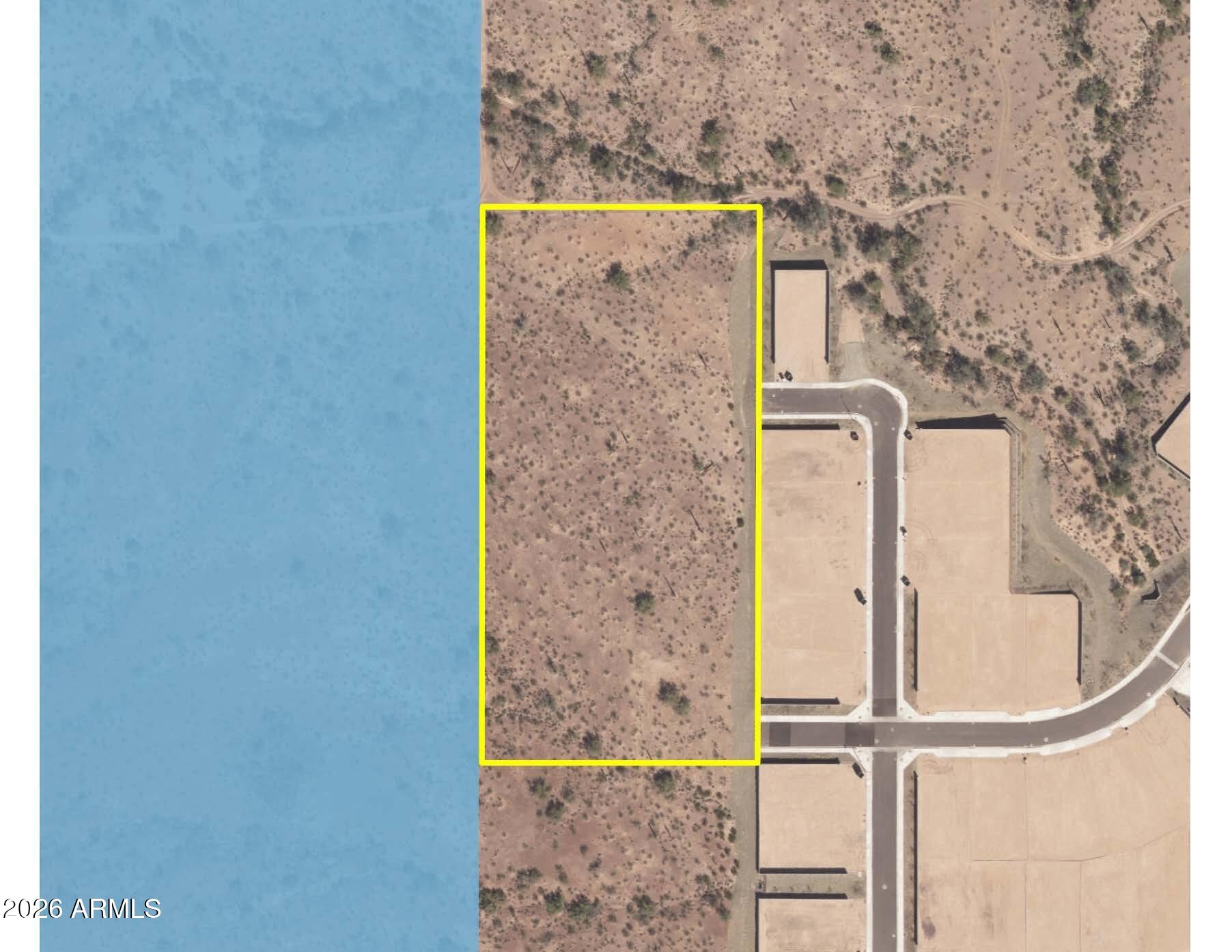 Zoning is PAD for up to 12 lots. Developer may reduce the number of lots provided they achieve compliance with the City of Peoria's city code and applicable engineering design standards, policies, and requirements. Paved road access and water/sewer stub outs to property.