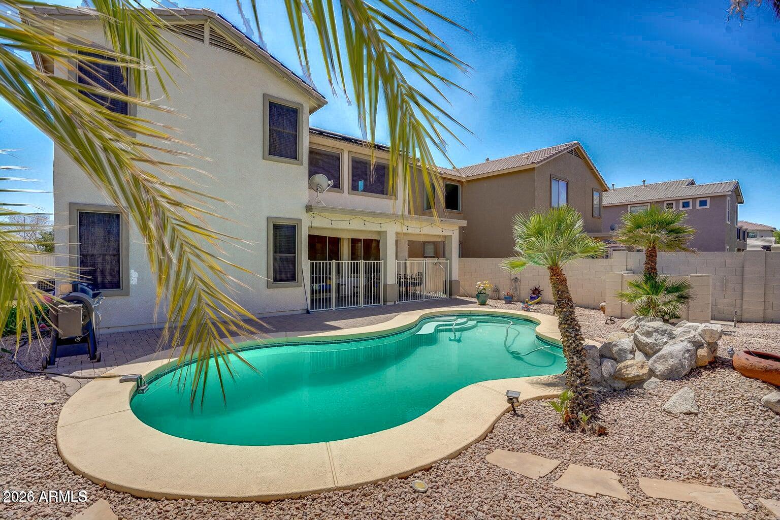 Welcome to this beautifully updated 3 bedroom home tucked away on a cul-de-sac lot in one of Surprise's most convenient locations. With an open concept floor plan, prepaid solar, a sparkling swimming pool, and a 3 car garage, this home checks all the boxes for comfortable Arizona living.

Inside, you'll find updated flooring, newer appliances a spacious layout designed for both everyday living and entertaining, with multiple living and dining spaces that flow seamlessly together. The floor plan offers added flexibility for growing families, guests, a home office, or workout space. There's also beautiful views of the White Tank Mountains.

Step outside to your private backyard retreat featuring a refreshing pool and space to relax, entertain, or enjoy sunny Arizona afternoons. The entire exterior of the home was also painted in 2025.  The prepaid solar is a huge bonus, helping provide energy efficiency and long-term savings.

Located just minutes from Prasada's shopping, dining, and entertainment, with easy access to Loop 303, this home also sits within a neighborhood known for its walking trails, parks, and nearby elementary school. Whether you're looking for convenience, community, or room to grow, this home offers the perfect blend of it all.