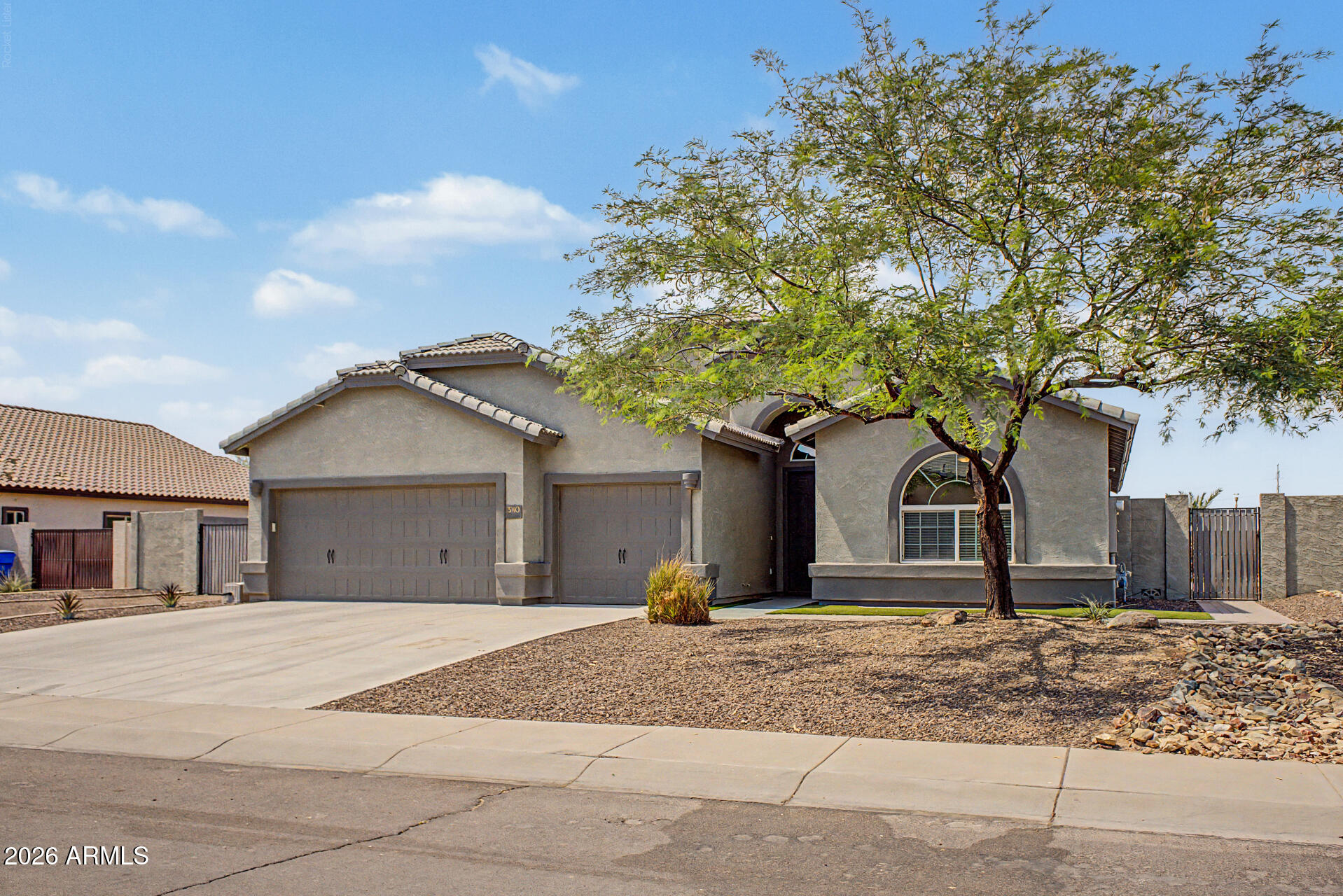 Location, Location, Location!  Huge, beautiful property, only 15 minutes from downtown or airport.  Stunning home on 1/3 acre lot, north/south exposure with views of downtown and South Mountain.  Home features large great room with 13 ft high stair step ceilings.  Kitchen has tons of storage, beautiful 42 inch upper cabinets, granite countertops, and a gas stove.  A very spacious master bedroom has vaulted ceilings and looks out to the pool.  Master bathroom has dual sinks and a beautiful walk-in glass snail shower.  Secondary bedrooms have a Jack n Jill bathroom with dual sinks.  Refreshing pool features an in floor cleaning system, upgraded filter, and LED colored lights.  Home has a 3 car garage with service door and a 12 ft RV gate to help house all your toys.  Welcome home!