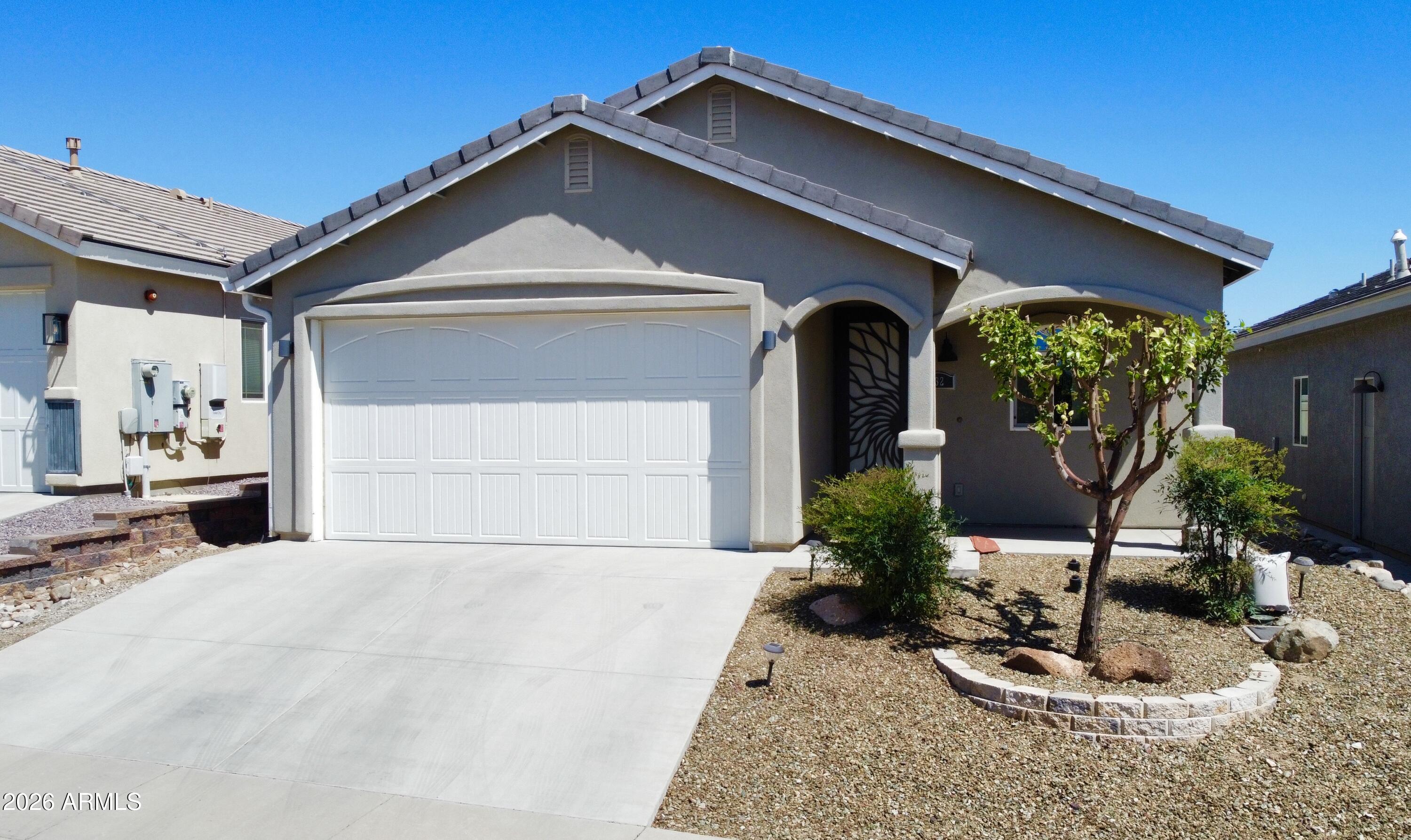 Beautifully maintained home in the quiet, welcoming Crossroads at Mingus neighborhood. Enjoy a private fully fenced backyard, easy-care landscaping, low-maintenance stucco exterior, water softener, and a cozy heated floor in the primary bathroom. The efficient floor plan offers comfortable living spaces throughout. With a super low HOA of only $100 per year and easy upkeep, this home is ideal for full-time living or a lock-and-leave lifestyle. Conveniently located near the hospital, shopping, grocery stores, dining, and outdoor recreation including hiking and biking. Pride of ownership shines throughout this inviting home. 
***Seller may consider owner financing for a qualified buyer.*** 
Owner/Agent.
