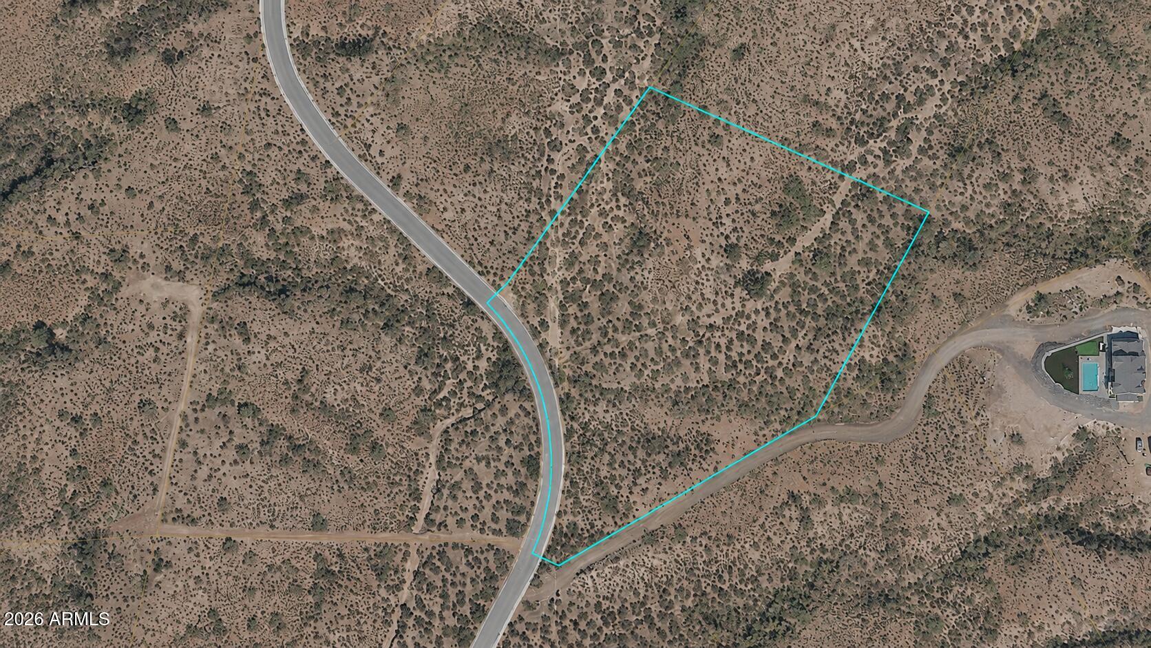 Beautiful 5.03-acre parcel with a naturally elevated homesite showcasing mountain views and a highly usable layout ideal for a custom home, horse property, or private retreat. The lower portions of the property offer ample space for stables, horse pens, riding arenas, workshops, and other supporting structures, while additional elevated areas provide excellent potential for a detached garage or guest casita opportunities. Located on a quiet paved road with asphalt access directly to the lot and an easy transition to a future paved driveway. Power is available at the property line; buyer to verify availability with Salt River Project. Conveniently located approximately 40 minutes from Phoenix Sky Harbor International Airport with abundant nearby OHV and horse trails, plus access to surrounding national forest areas and Saguaro Lake for endless outdoor recreation. Survey pins are marked with white PVC and orange tape.