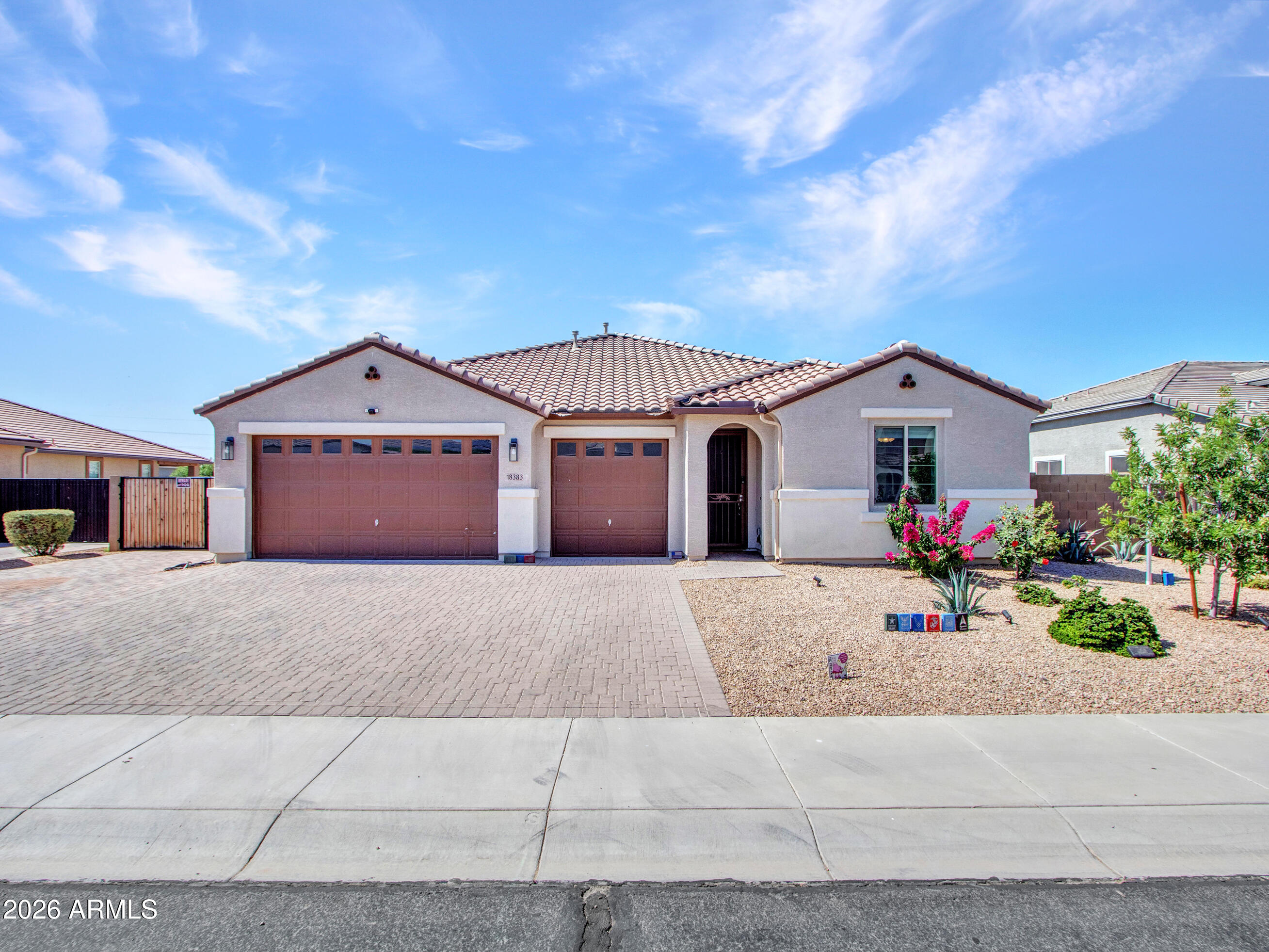 Beautifully upgraded  ''Darius'' model with paid solar, private guest suite/ mother w/ separate entrance, resort-style pool & an entertainer's backyard! Built in 2019 and situated on an oversized lot, this 4 bedroom, 3.5 bath home offers 2,827 sq ft of thoughtfully designed living space with premium upgrades throughout. Gourmet kitchen features 42'' shaker cabinetry, granite countertops, gas cooktop, double ovens, black under mount sink, RO system, custom buffet cabinetry, soft-close drawers, and oversized sliding glass doors with electric shades. Spacious primary suite includes deluxe bath upgrade w/ dual sinks, rain showerhead & walk-in shower. Private Guest suite includes living area, wet bar, wine refrigerator, bedroom, bath, separate entrance, and its own thermostat Backyard oasis features private pool with Baja shelf, waterfalls, scuppers, play jets, travertine decking, turf, pergola with power, misting system, and app-controlled lighting.Separate grassed/ gated area for dog run. Additional upgrades include 3-car garage with custom storage, 100-amp garage service, RV gate, extended paver driveway, whole-house water softener, TUFF shed, security door, and separate A/C zones & PAID IN FULL SOLAR!