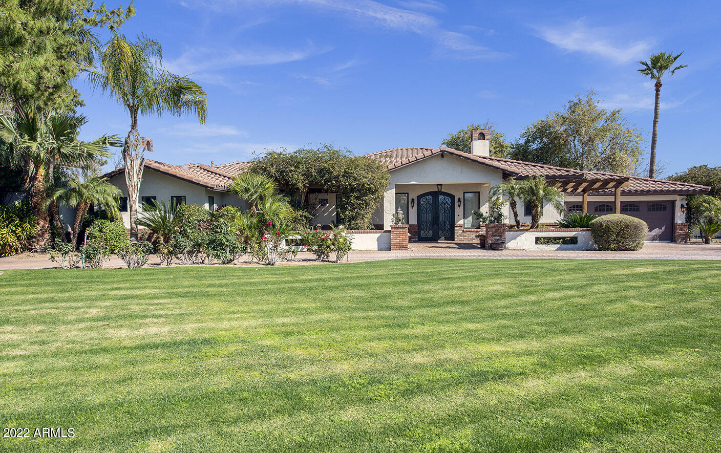 Beautiful Santa Barbara architecture with a thoughtful, single-level floor plan. The great room is adjacent to the open, double-island kitchen, wet bar and dining room areas. The master suite has multiple walk-in closets (three) and a delightful indoor fireplace. The spa-like master bathroom is complemented by a cozy, private heated spa and outdoor fireplace. The backyard is an entertainer's paradise featuring a shaded grill area, a heated pool & spa, a 6-hole putting green and a large grassy, play area. Seller recently replaced all three HVAC units and one hot water heater in advance of going to market. The property has no interior steps. No HOA!