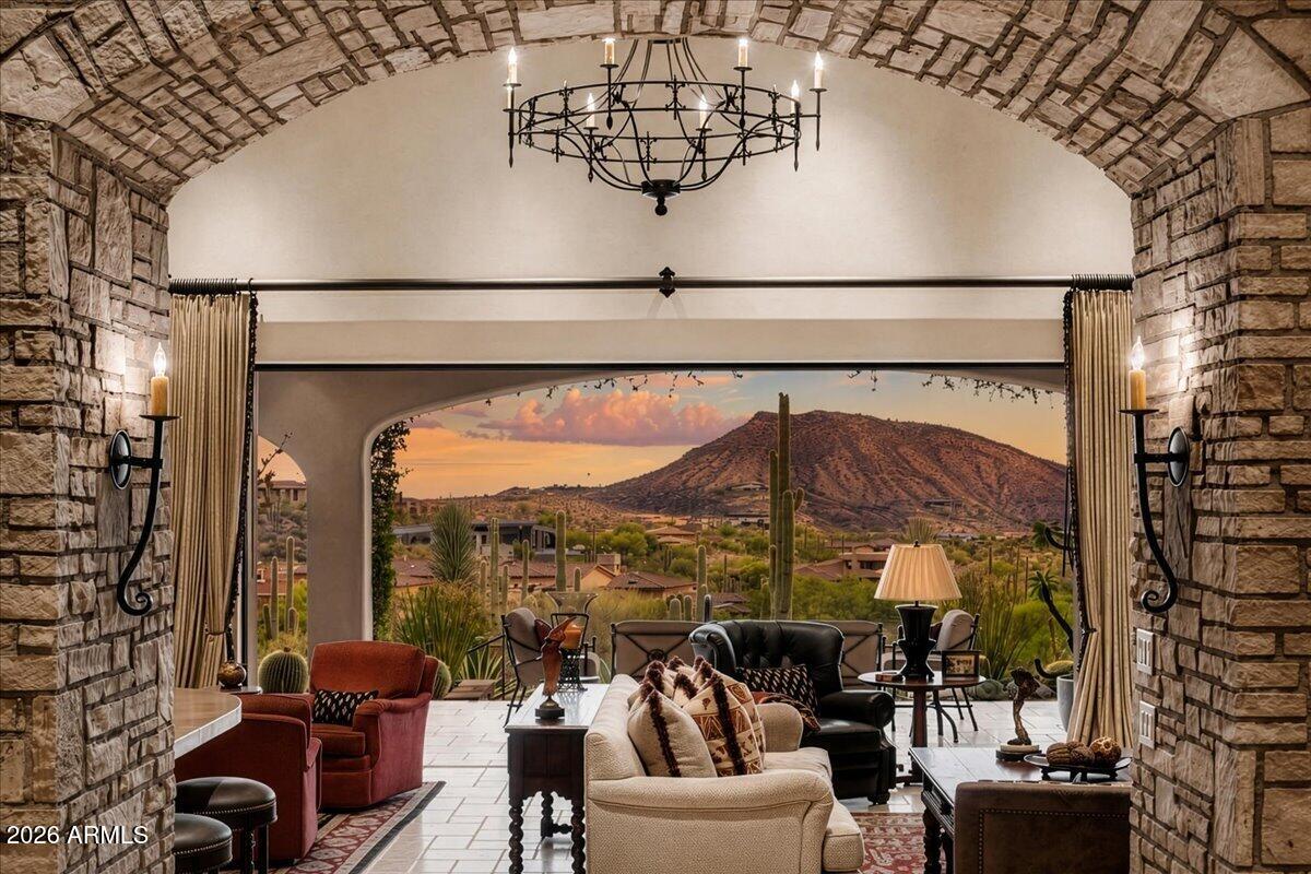 This elegant and sophisticated one of a kind estate will awe the most discriminating clients and customers. They don't build them like this anymore! The attention to ornate details and finishes are unparalleled. This home is offered at near replacement cost in today's market. If you want views and privacy...well this is it! Designed by James Conrad and built by Stonehenge (Ric Morielli), a unique collaboration of a talented team that only a few end users can enjoy and appreciate for years to come. Come see for yourselves and don't  miss this one time offering. Views of Chiricahua golf course, city lights, sunsets and mountain views that take your breath away are forever. Four ensuites plus an office, exercise room, attached guest suite and an oversized 3 car garage with storage awaits you! Select furnishings available by separate agreement. Make your appointment today to see this fabulous home.