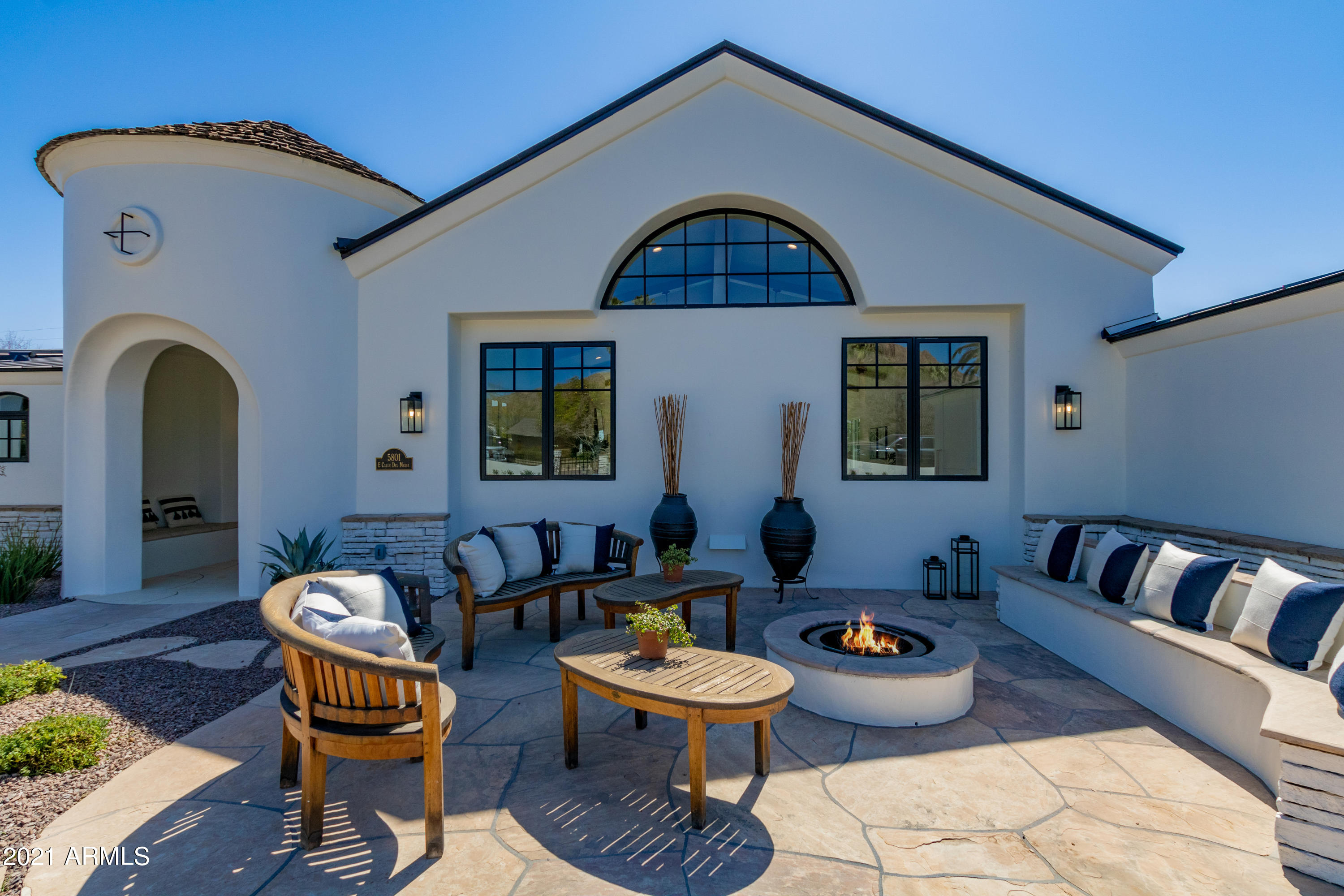 Stunning Arcadia remodel like new construction. Entertainer dream with ideal N/S Camelback views on 1/2 acre, corner, cul-de-sac lot.  Light and bright open concept kitchen with expansive 12' island. Calacatta Gold quartz countertops, Sub-Zero/Wolf appliances with 60'' range, paneled 6' refrigerator & freezer, convection steam oven, warming drawer & wine storage. Hidden walk-in pantry serves as wet kitchen featuring storage, countertops & sink. Craft/laundry room features island with storage, farm sink, 2nd dishwasher, mud room lockers with doors & desk. Garage entrance features a key drop area & additional beverage refrigerator. Bonus guest house used as an office, workout room & kids loft.  All rooms enjoy sunset Golden Hours spanning the house to front & back yard. Best bring offers! Pool bath has access from the exterior. Smart Home features include Nest thermostats, Ring doorbell, Lutron Caseta switches, Swann security camera DVR and Ubiquiti wireless network as well as Cat6 hardwiring.