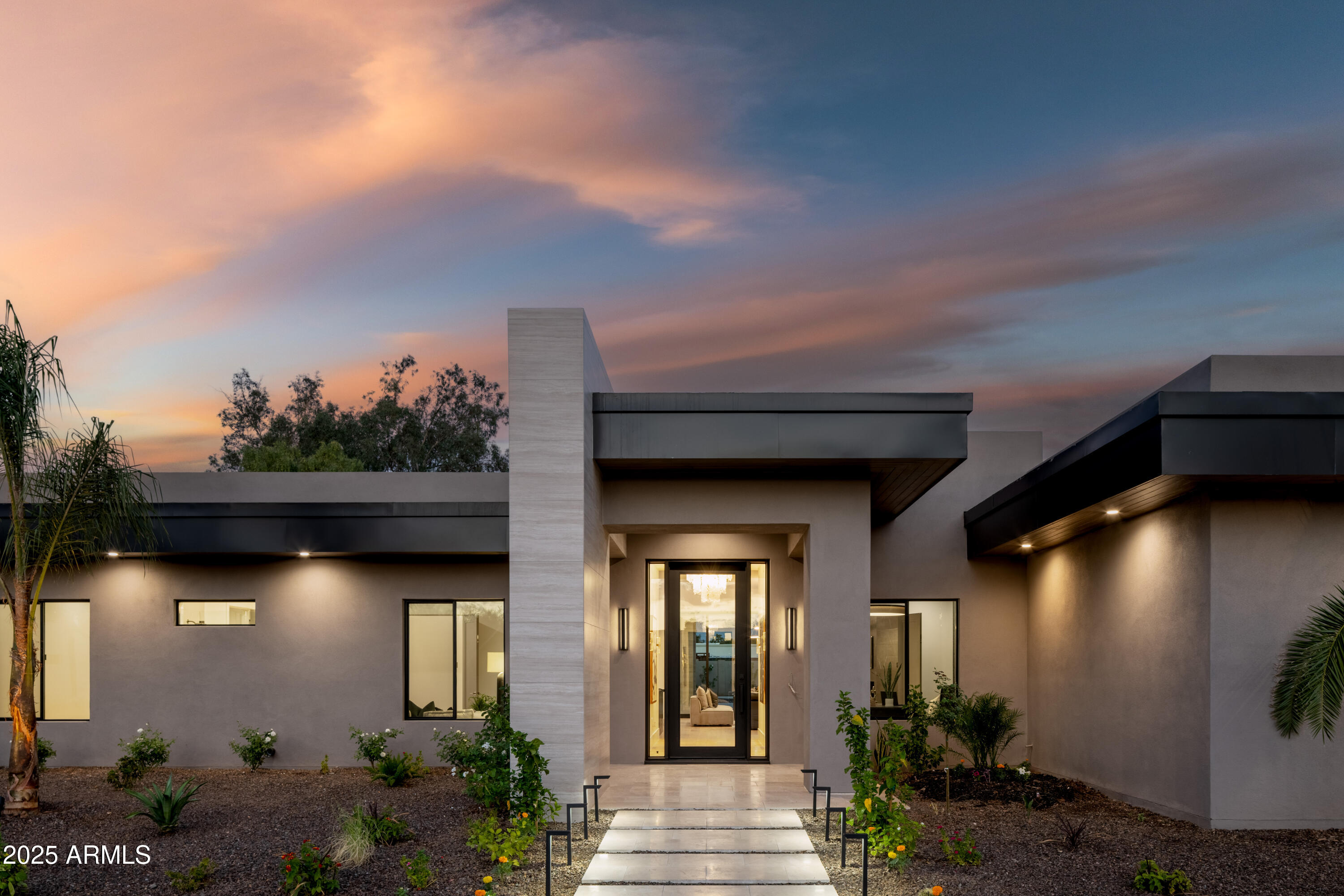 Where art and home collide! This brand-new modern estate by OUD Development redefines Scottsdale luxury living—bold architecture, curated finishes, and flawless flow! Every line, texture, and detail was designed with intent—from the open great-room floor plan to the striking wet bar and seamless indoor-outdoor connection. The chef's kitchen is pure statement—Sub-Zero and Wolf appliances, a built-in Miele coffee system, and a hidden walk-in pantry that blend beauty and function effortlessly.

Four ensuite bedrooms, a dedicated office, and a spacious game room complete the main home—each space crafted for light, proportion, and refinement. The private guest house offers full independence with its own kitchen, living area, and laundry—ideal for guests or extended stays! Outside, on a half-acre lot, discover your resort retreatpool, spa, pergola, built-in BBQ, and firepitwith room for a future sport court! Finished with a 4-car garage, this home is luxury composition, not construction.