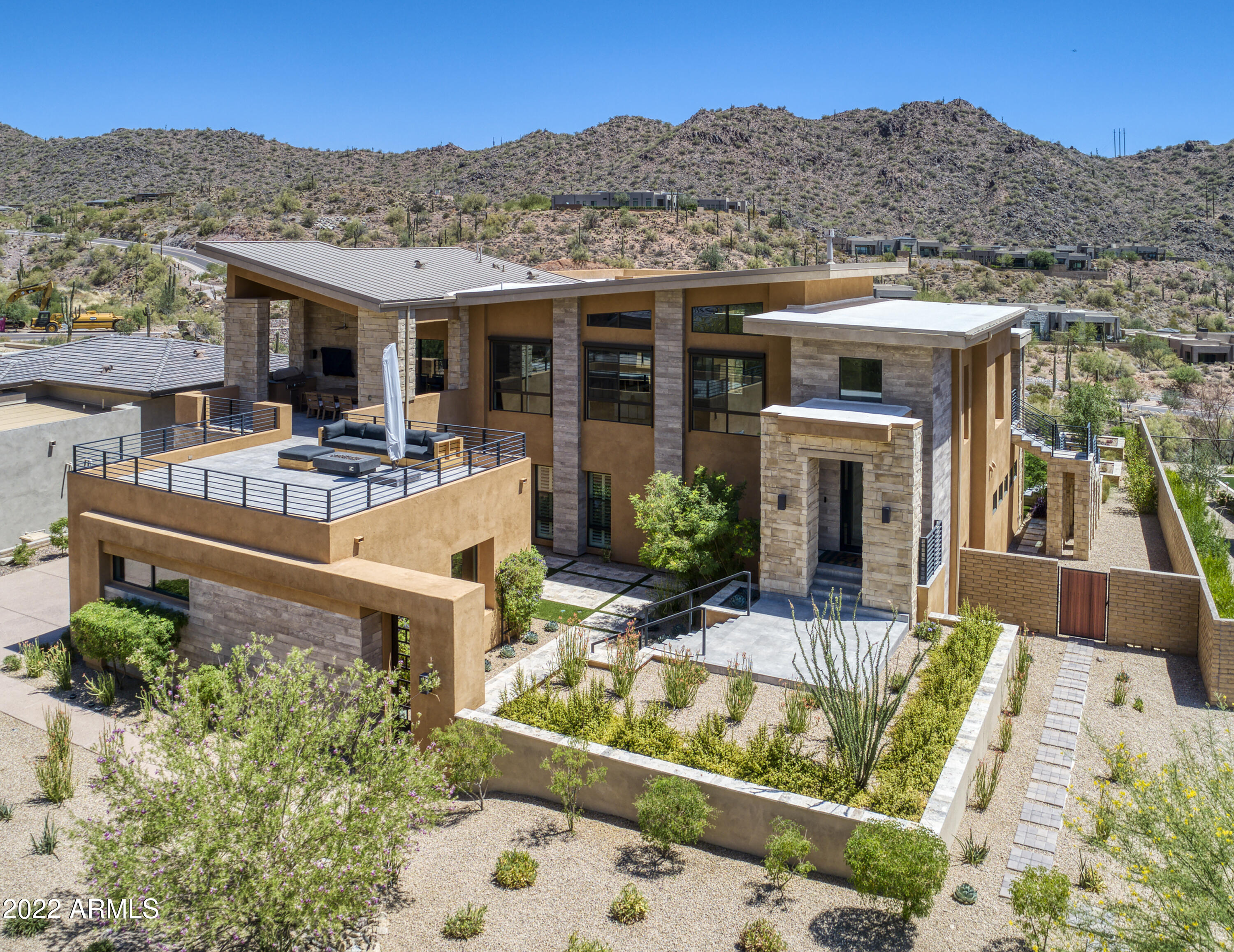 This Modern home is situated in the prestigious Adero Canyon community. Enjoy the Stunning Panoramic Views & the outdoor Lifestyle Living for Entertaining. The upper-level living space includes a top-of-the-line kitchen complete with Wolf Sub-Zero appliances & large island. The kitchen opens up to a 900 sq. ft. patio with dining and outdoor seating, BBQ & views. The great room has a soaring 14 ft. ceilings & a gas fireplace which opens to a 500 sq. ft. patio featuring Serene Canyon views. 4 total Bedrooms W/En-suite Bathrooms plus Office. 1 is an attached Casita with private entrance, perfect for guests. The Downstairs outdoor area features a 2nd BBQ, Fridge and Prep area with a refreshing Pool/Spa steps away! A few more improvements--New Control 4 Home system, Painted interior, Remote controlled shades, New Wood Flooring in Casita, Garage cabinets, Paver walkway, New "bigger" pool heater, tub sink in garage & Gas line to upper deck. Views in all directions!  Don't Miss this unbelievable home!