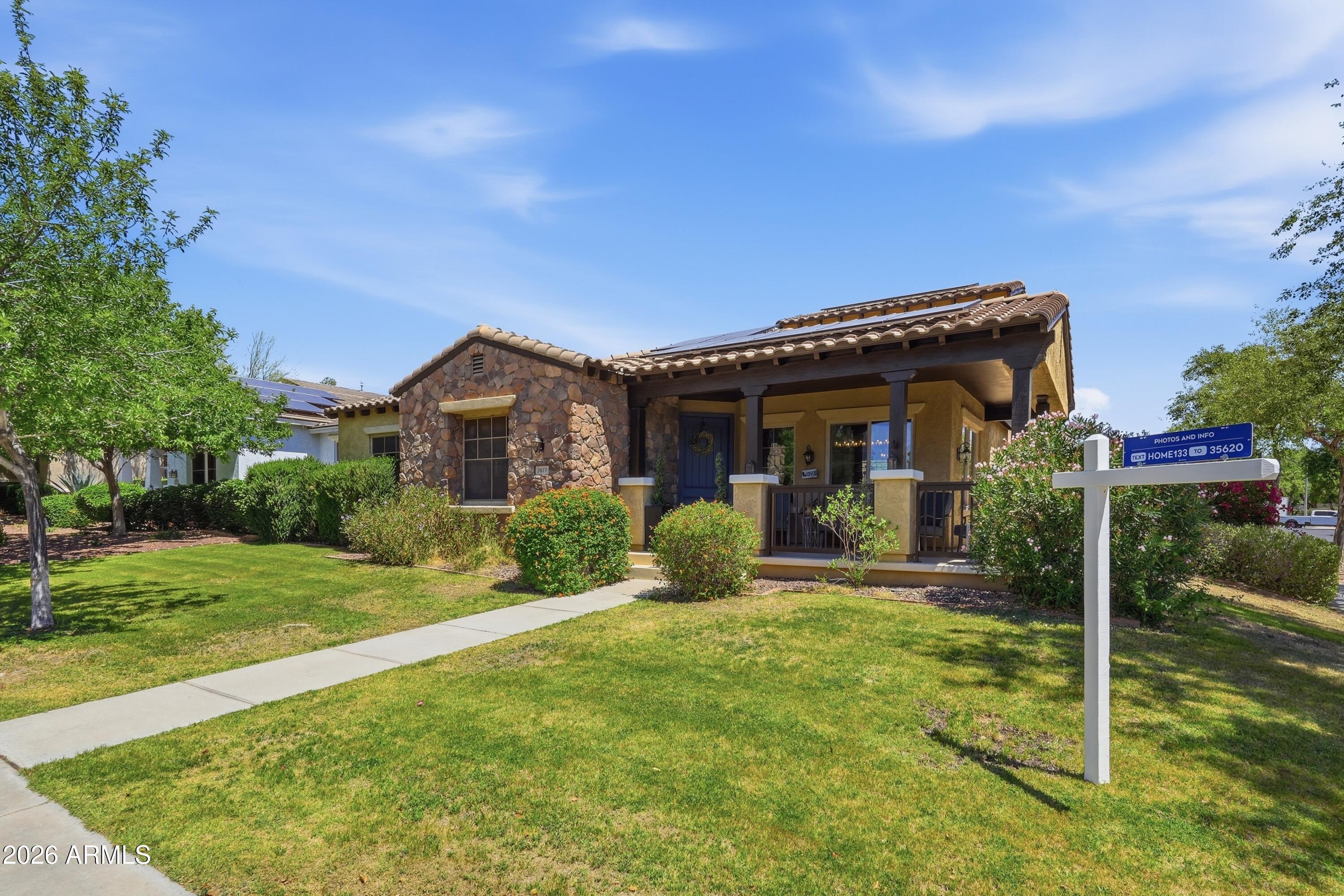 Get ready for summer in VERRADO on a corner lot on one of the most desirable streets with a lot of parking. SELLERS PLAN TO PAYOFF SOLAR LEASE AT COE, THIS GIVES BUYERS ABOUT 16 YEARS OF FREE SOLAR!  This beautiful home has 4 bedrooms, 3.5 bathrooms (updated).  From the large great room with two story ceilings to the kitchen which includes double ovens, gas cooktop, and a breakfast bar with granite counter tops, this house is great for entertaining. The owners' suite is located on the first floor, with an updated bathroom that has a large tub and separate shower, along with a double vanity. On the second floor there are 3 bedrooms with one as a ensuite and a loft. This house has two outdoor areas, a courtyard & a back patio with a deep pool. This house is a must see!