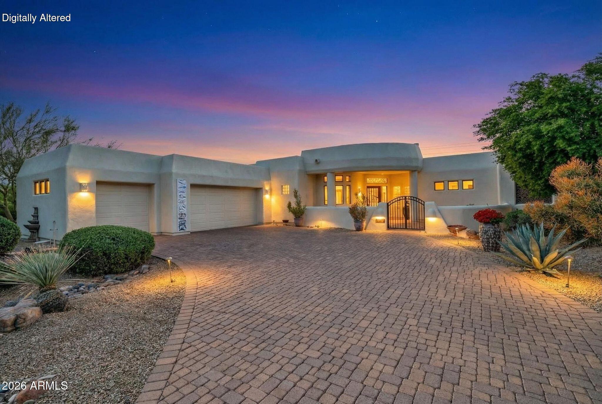Want to see something fresh and different?  This custom Home by Phoenix Smith in the gated community of Tonto Verde is a must see. Enter the private courtyard to an open and vibrant custom home. Slate tile and wood floors in all rooms. High ceilings throughout allow each room a light and bright feeling and feature recessed lighting. Enjoy the enclosed private spa off the primary suite. Second bedroom has ensuite bath, private access to the backyard, and split from master. Den features a pass-through fireplace for a cozy workplace and direct access to the patio.  Designer kitchen, granite counter tops, island with cooktop, built in desk, extra-large walk-in pantry and a second island breakfast bar. The backyard is large with mature trees for privacy and completely fenced for your doggie friends (plus snake fenced). Full 3 car garage with mini split heat/cooling, epoxy floor and built in storage cabinets. New Lennox HVAC units installed in 2025 , a $40,000 value. A must see if you desire a very special home.