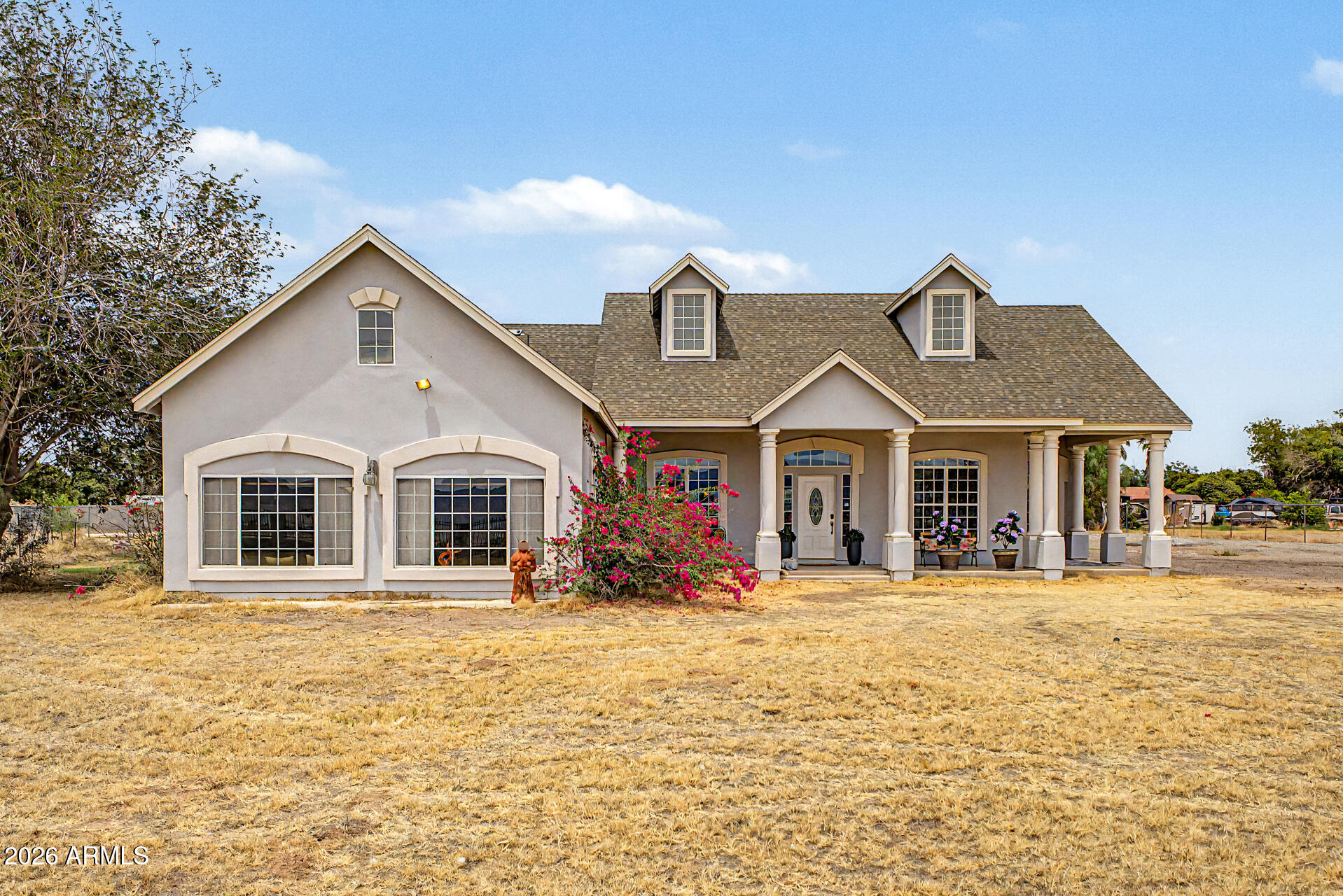 Custom built horse property situated on 1.17-acre lot, with no HOA! This thoughtfully designed home has tall vaulted ceilings, and tons of natural light. Enjoy multiple living spaces, including a den/office, dining room, and a large living room highlighted by a floor-to-ceiling stone fireplace. Kitchen is equipped with SS appliances, abundant cabinetry, tile countertops & backsplash, a center island, and a bay window in the breakfast nook. Large primary offers French doors that open to the back patio, an ensuite with a soaking tub, and a walk-in closet. Spacious bonus room with built-in cabinetry offers endless possibilities as a game room, hobby area, or media room. RV garage built to accommodate any vehicle you have, or plenty of space to make a personalized gym/workspace. Expansive backyard provides a covered patio, a swimming pool, and a detached 4-car & RV garage that can also serve as a workshop or additional storage space.