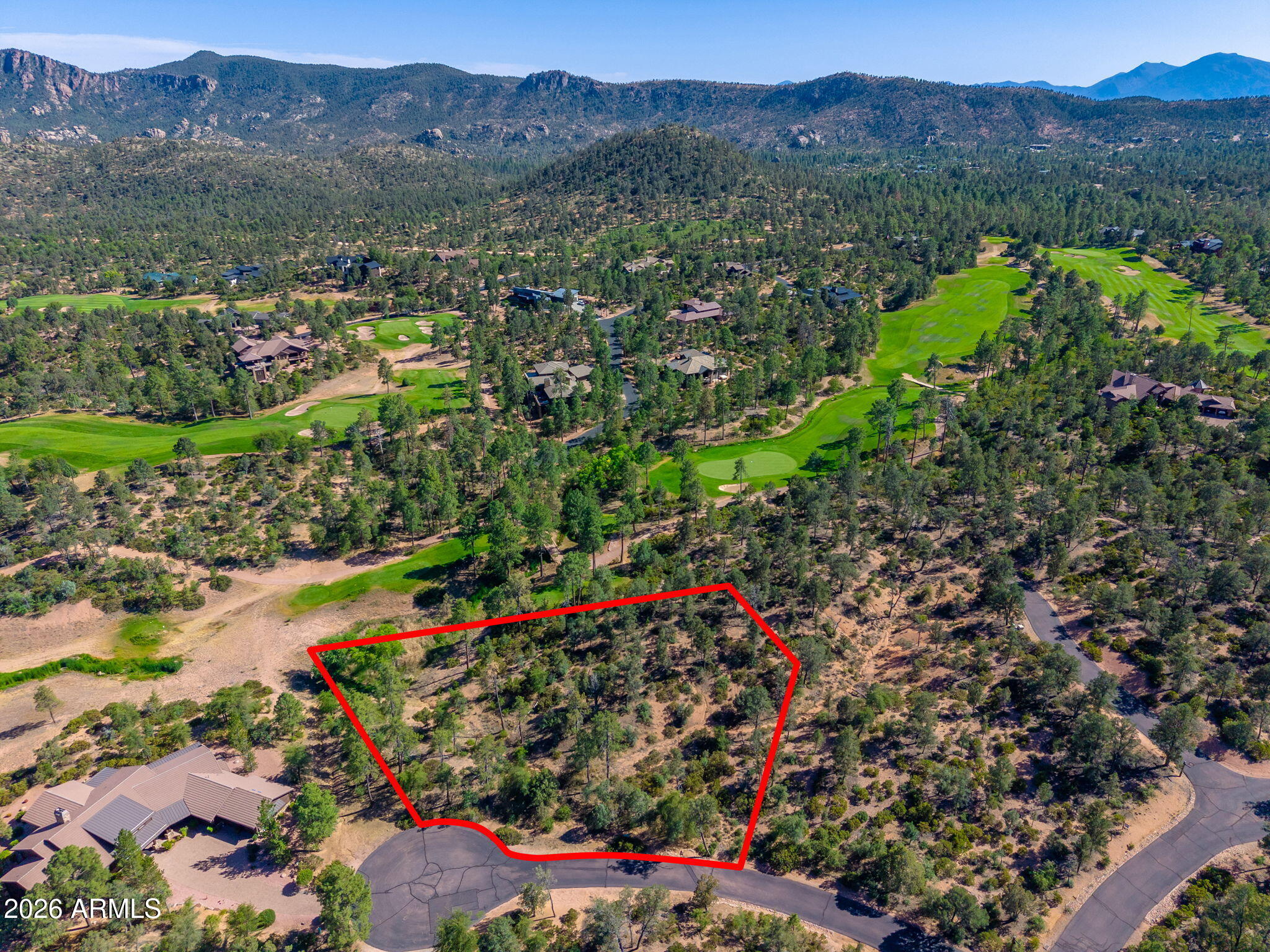 Beautiful 1.04-acre cul-de-sac homesite tucked away within the gates of the prestigious private country club community of The Rim Golf Club, one of Arizona's most sought-after communities located in Payson. Enjoy nice mountain views while perched above a scenic pond and the 8th hole, creating a peaceful setting surrounded by tall pines. This premium homesite is the perfect place to build your dream home and enjoy the cool mountain climate, golf, and lifestyle that The Rim Golf Club has to offer.