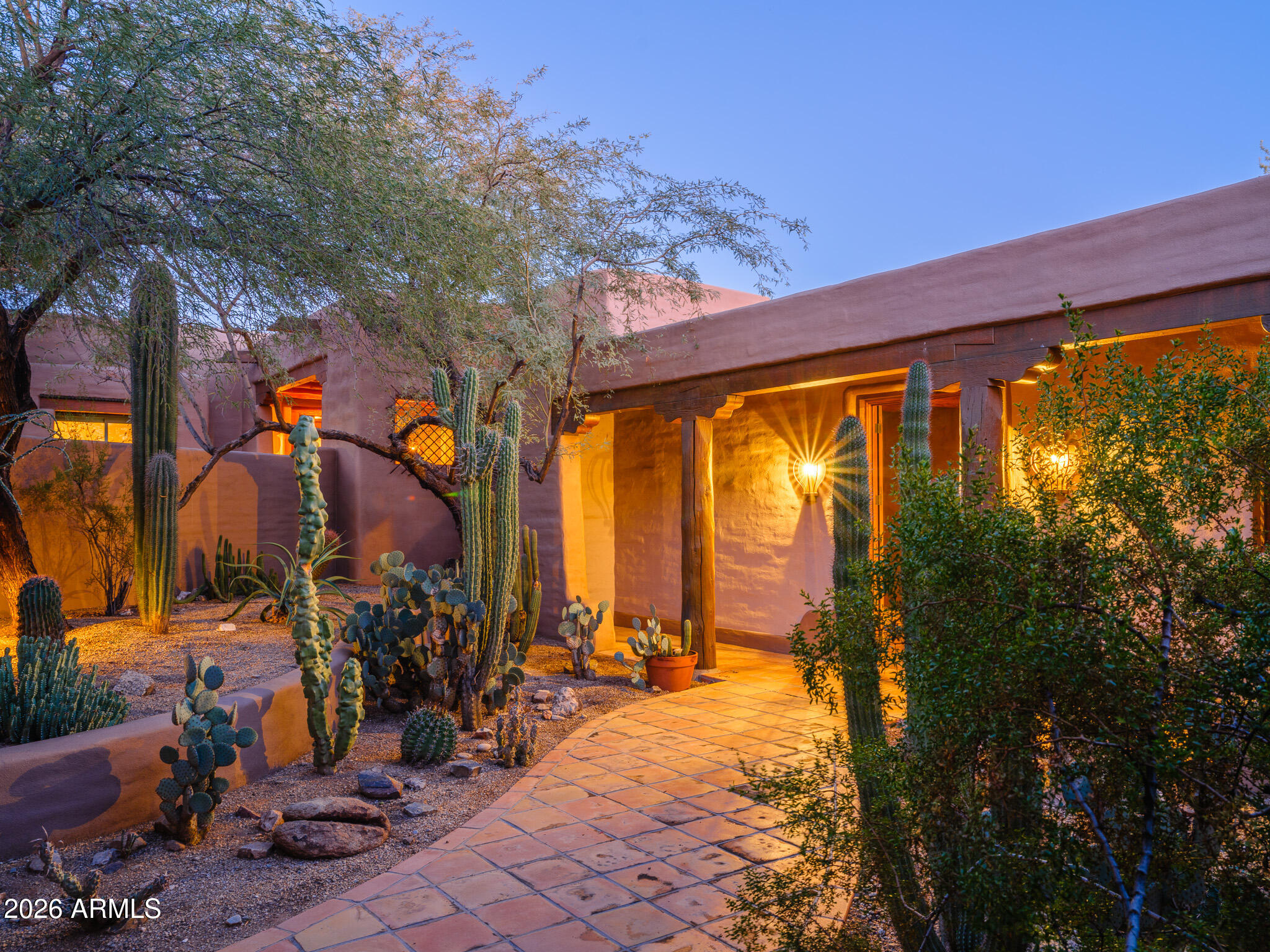 Rare 2-AC Paradise Valley estate W/Camelback Mountain views located in highly desirable luxury corridor surrounded by newer multi-million dollar homes. Unique opportunity combines land, location, lifestyle & potential. Property includes 2 homes!, casita, shop, authentic Arizona architecture, quality construction; ideal for renovation, expansion or reimagination. 
Detached multi-car garage shop offers additional value for car collectors, hobbyists or flex use. Flat usable parcel w/ outstanding Camelback view provides excellent foundation for a custom estate or long term investment in lifestyle. Ideal location near Hermosa Inn, PCDS. Close to dining/resorts/golf and shopping. Exceptional combination of location, land size, privacy and views! PV buyers demand large estate lots; this is it! Paradise Valley Heritage Luxury -  2 Acre Estate Lot

Opportunities of this scale and character in Paradise Valley are rare. Set on a full 2 acre parcel with Camelback Mountain views, this property offers a unique balance of land, location, lifestyle and potential.  Nestled among newly constructed multi-million dollar estates, the setting reflects a clear transition toward high-value custom homes while preserving the privacy and space that define Paradise Valley living.

The premier estate includes two residences and a separate casita, each reflecting authentic Arizona heritage architecture and quality construction that lends itself well to renovation, expansion, or reimagination. Superior materials and craftsmanship provide a strong foundation for those seeking to enhance rather than replace, while a substantial detached multi car garage and workshop building adds a rare amenity for car collectors, hobbyists, or flexible use during redevelopment.

Located by Hermosa Inn and near Phoenix Country Day School, this residence offers both historic significance and enduring appeal.  Whether enjoyed as a multi-generational hacienda, envisioned as a cultured renovation, or reimagined as a new custom estate, this is a rare opportunity to create something enduring in Paradise Valley.

Features

2 acre estate parcel in Paradise Valley
Camelback Mountain views
Two homes plus casita
Authentic Arizona heritage architecture
Quality construction suitable for renovation
Flat usable land with strong view corridor
Located in a premier luxury redevelopment area
Surrounded by new multi-million dollar estates
Detached multi-car garage and workshop building
Ideal for car collectors or hobbyists
Near Phoenix Country Day School
Near Hermosa Inn and resort corridor