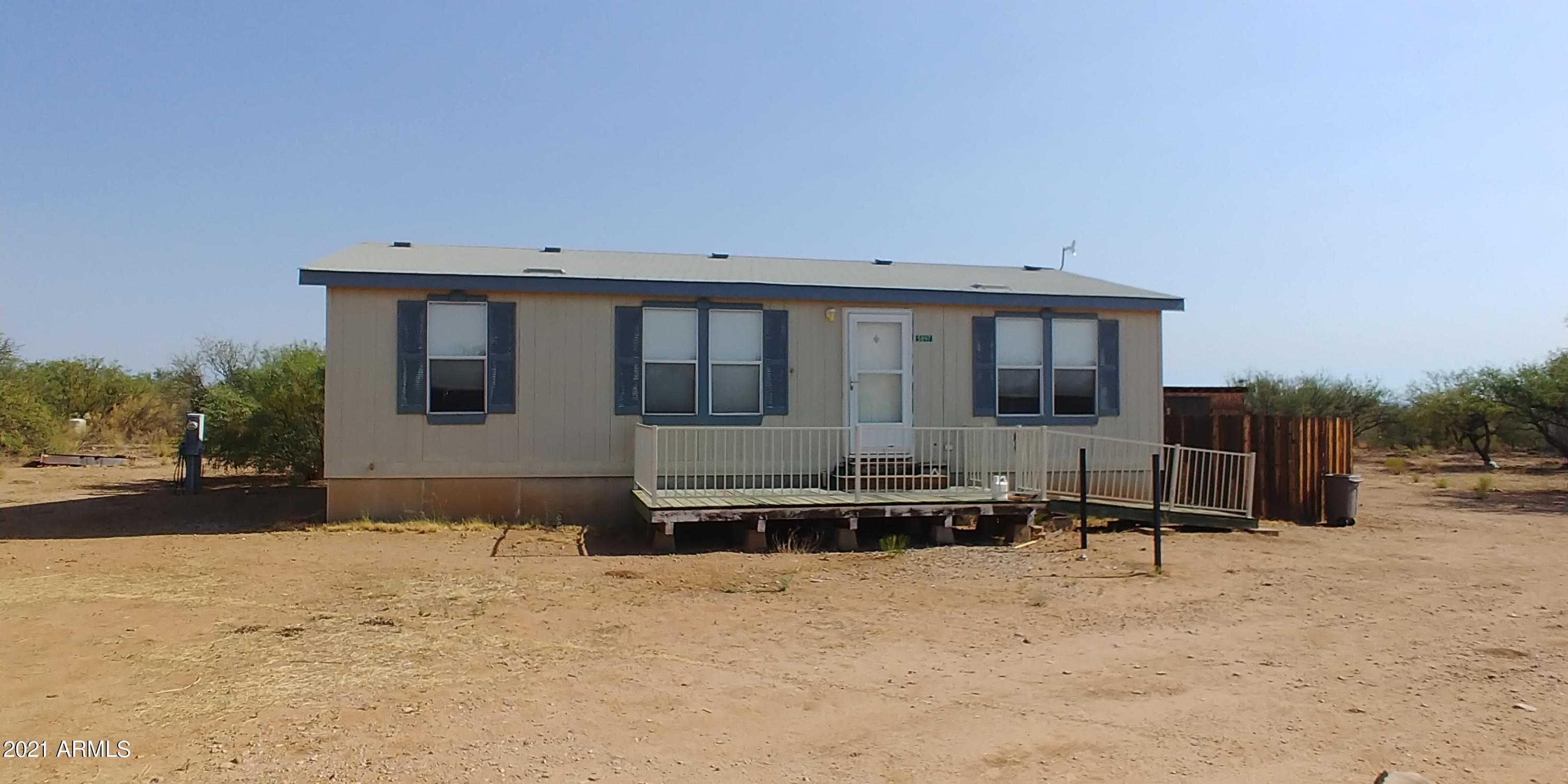 Here is a great opportunity for a reasonable priced home in todays market. There is a split floor plan and new laminate flooring in most of the house. The washer and dryer are almost new! There is wonderful natural light making this a very happy house. There is also a fenced yard in back and a peach tree too! This home is close to town and all amenities Sierra Vista offers. Even though this says it is in a flood zone, the seller pays $58.00 per year for flood insurance so it should not be an issue. Dont wait or you will miss this home.