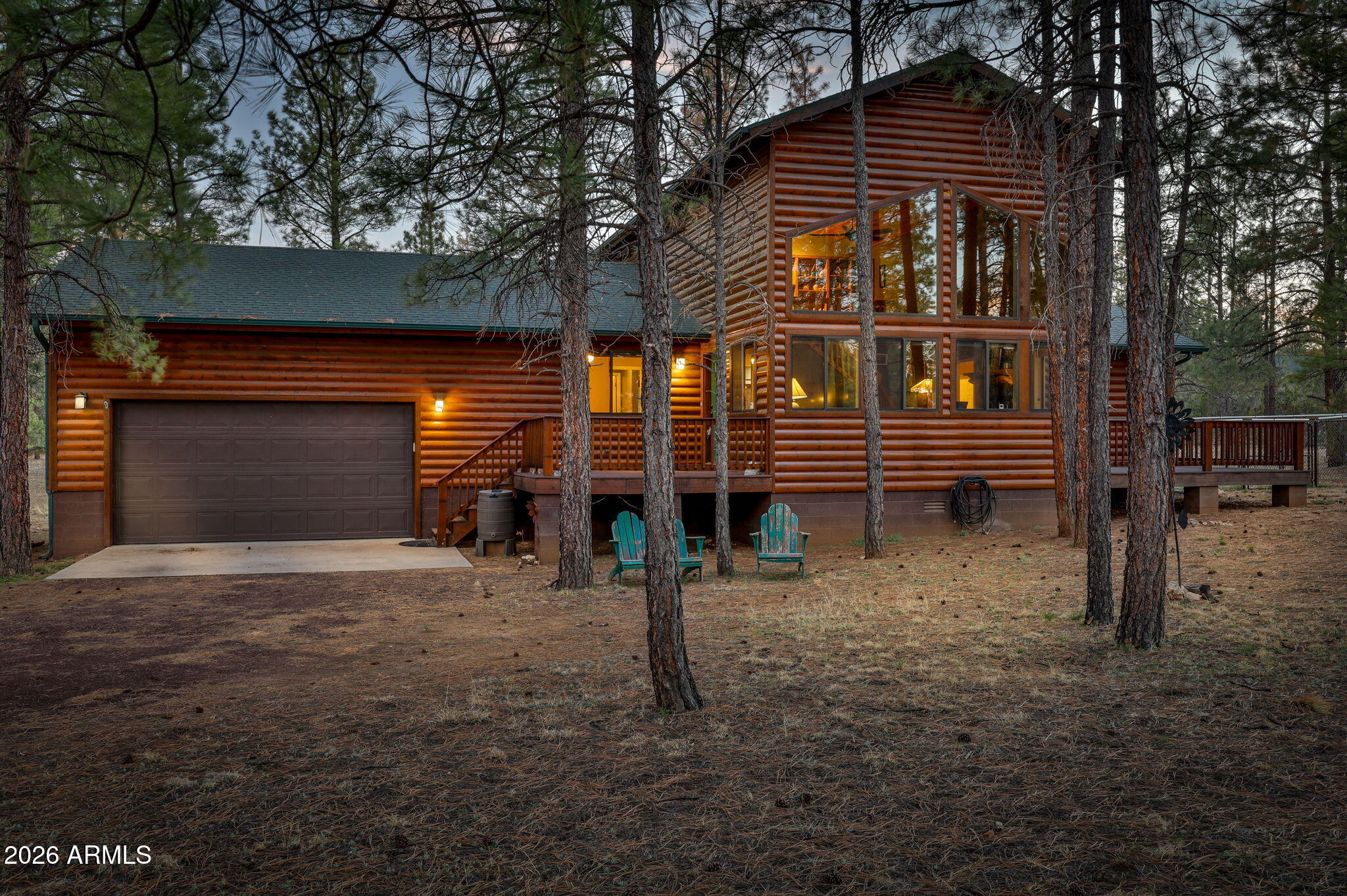Mountain Chalet Retreat Among the Ponderosa Pines
Experience true mountain living in this stunning log-sided chalet-style home surrounded by towering Ponderosa Pines. With 1,928 sq ft, 3 bedrooms, 3 baths, and a spacious loft, this home offers the perfect blend of rustic charm and modern comfort.
Step into the great room where a dramatic wall of windows brings the outdoors in and fills the home with natural light. The centerpiece of the living area is a spectacular floor-to-ceiling rock-faced wood-burning fireplace, perfect for cozy mountain evenings.
The kitchen is designed for both function and style with granite countertops, abundant knotty oak cabinetry, and convenient pull-out drawers.
Relax and entertain on the large covered deck, ideal for enjoying cool mountain air and peaceful forest views.
Additional highlights include:
Attached two-car garage
Detached two-car garage (perfect for toys, workshop, or extra vehicles)
Central propane heat with air conditioning
New roof currently being installed
This beautiful chalet offers privacy, space, and the perfect setting for year-round living or a mountain getaway.