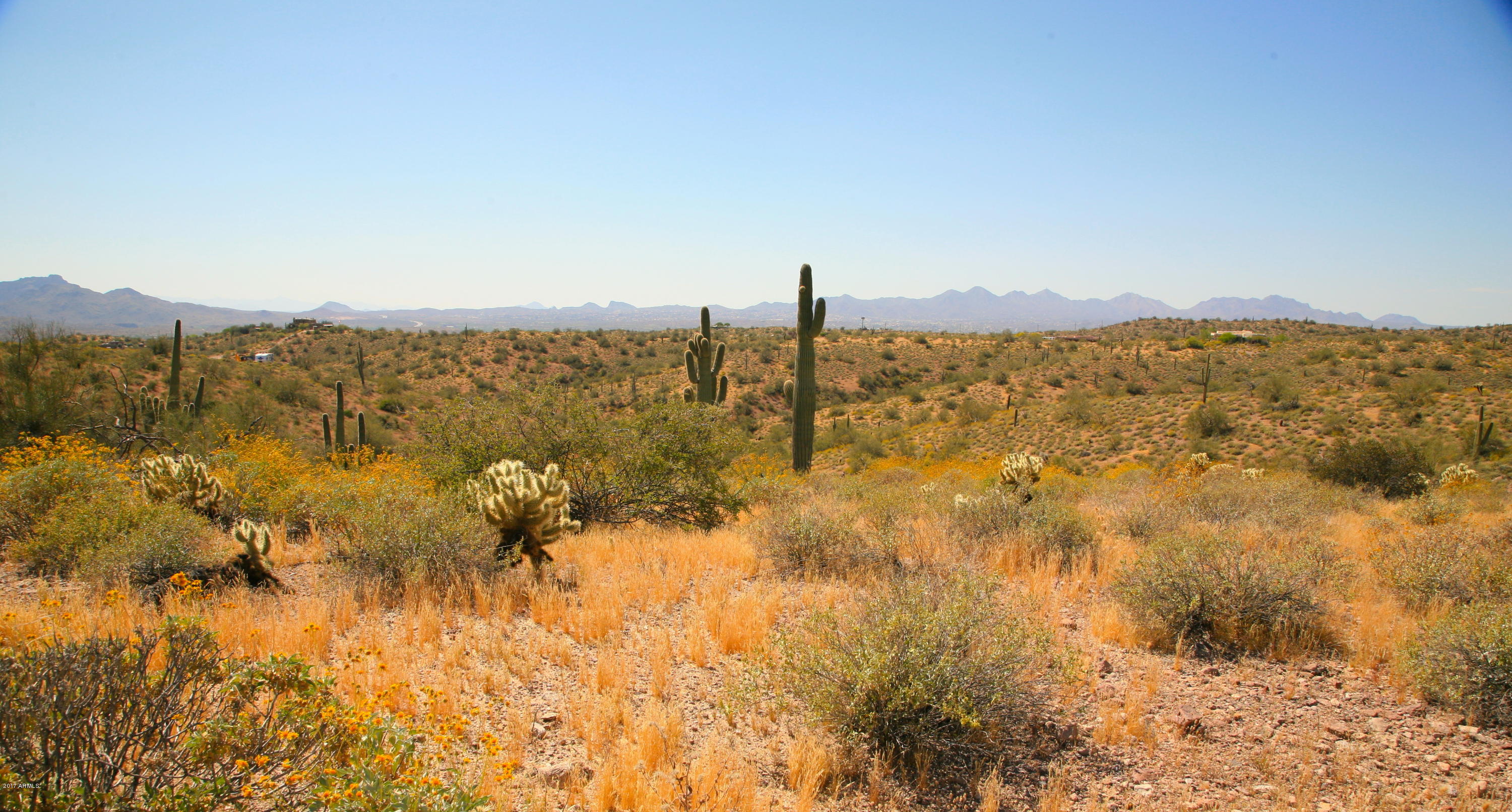 Private and Elevated gently sloping 10 Acre Custom home site with unobstructed Panoramic views of Four Peaks, Red Mountain, Fountain Hills and The Superstitions. Paved Road access. Sparkling City Light views of Fountain Hills and Mesa to the South. Minimum lot size in Goldfield Ranch is 4.36 acres affording great privacy. Breath-taking sunrises and sunsets! Come build your dream home. Goldfield Ranch is an Equestrian Community with access to the Tonto National Forest for great riding & recreation, yet Fountain Hills & Scottsdale are just 15-20 minutes away for restaurants, shopping and award winning golf courses. An easy drive North to Payson & the cooler country in the summer. Sky Harbor International airport is approx a 35 minute commute.