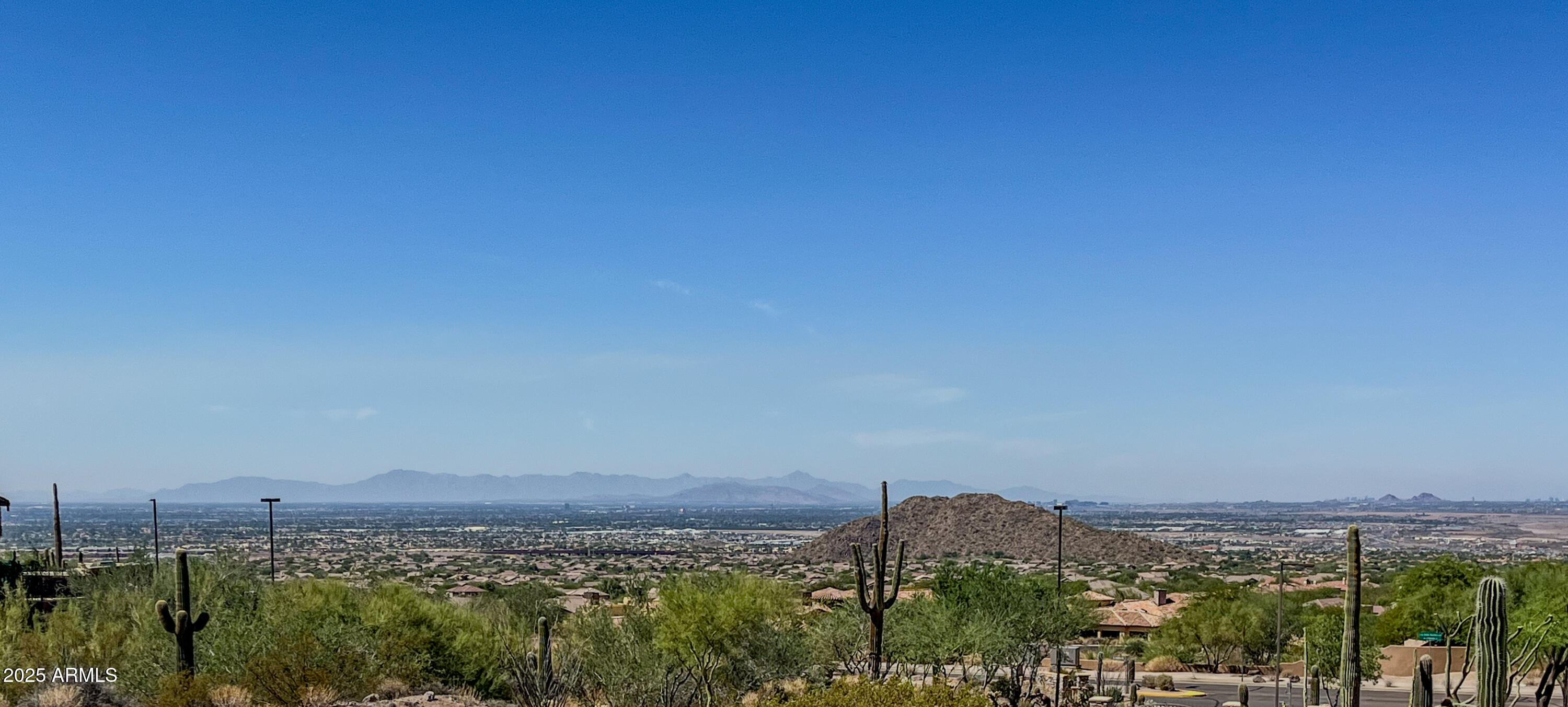 Located in one of the most prestigious subdivisions in Las Sendas (The Peaks), this oversized lot provides remarkable city-lights and mountain views, with a large building envelope. Homes in this subdivision range up to 10,000 square feet, and this lot can be shaped and filled to maximize the views, subject to rules of the City of Mesa Building Department and the HOA design guidelines. Enjoy Las Sendas's golf course (fees apply), hiking/walking trails, sport courts, parks, tot lots, community pools and spas minutes from shopping and dining, Loop 202 Freeway, Sky Harbor airport, downtown Phoenix, and midtown Scottsdale. Buyer to conduct due diligence to confirm all material information.