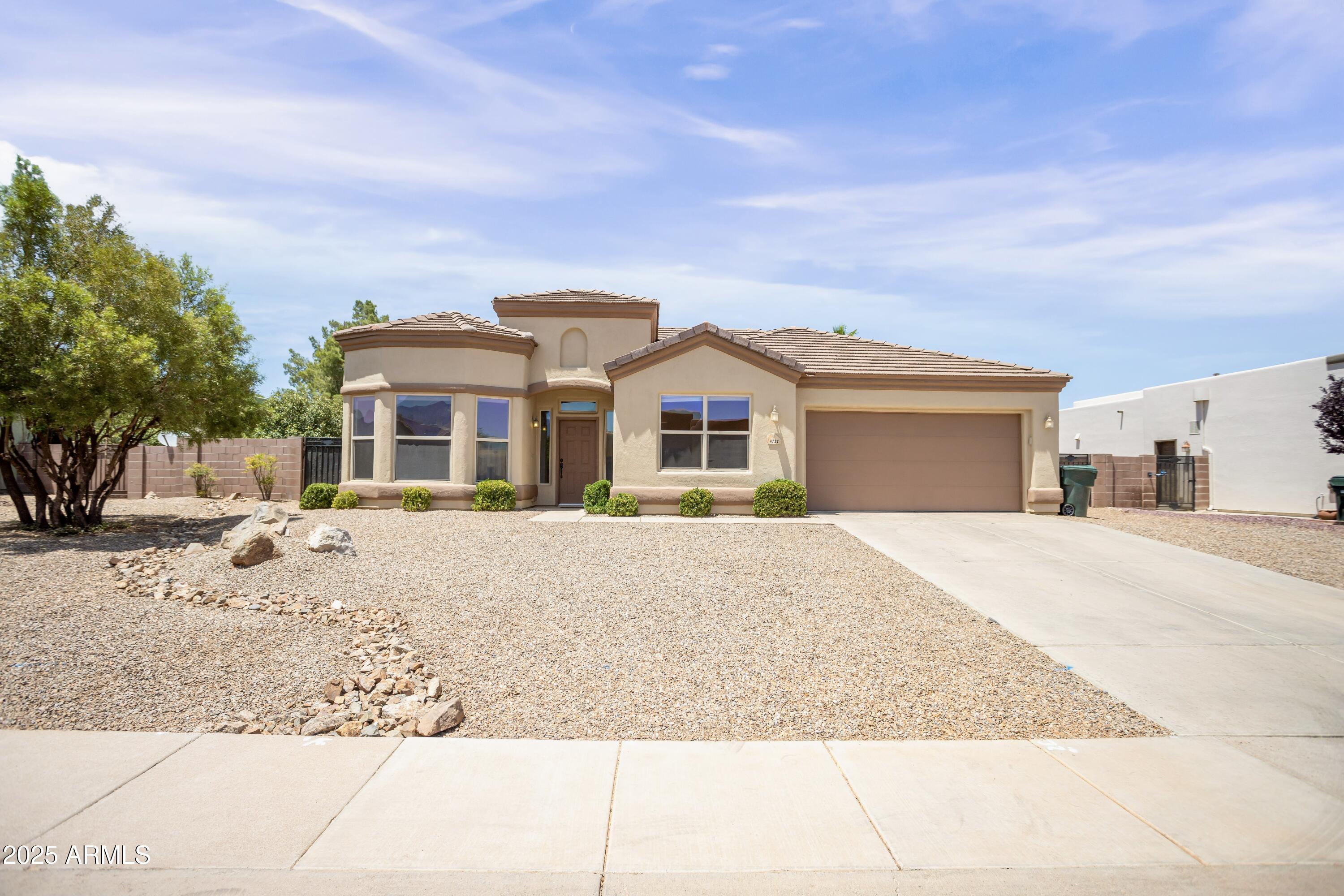 A Perfect Blend of Comfort, Style, and Outdoor Living! Step into this beautiful home that offers all the space and features you've been looking for. Boasting 4 generously sized bedrooms, 2 full bathrooms, this residence also includes 2 versatile dens/bonus rooms — ideal for home offices, guest rooms, a playroom, or even a personal gym. The heart of the home opens into a warm and inviting living area, perfect for both quiet nights in and lively gatherings. The open-concept kitchen seamlessly connects to the dining and living areas, featuring plenty of counter space and storage, a dream for entertainers and home chefs alike. Step outside and prepare to be impressed. The backyard oasis is a true highlight, featuring a sparkling pool and relaxing spa surrounded by lush landscaping. Whether you're hosting weekend barbecues or enjoying a serene evening swim, this outdoor space is designed for year-round enjoyment.