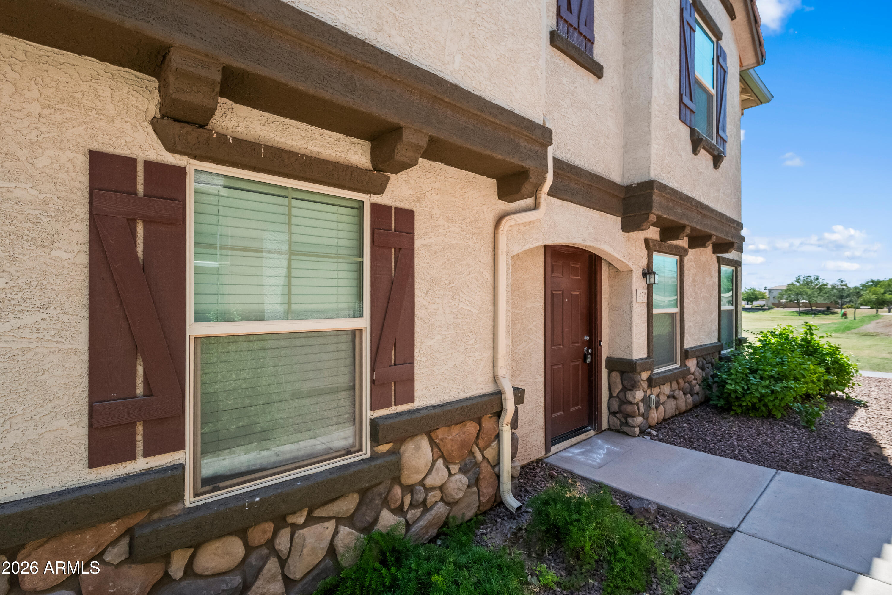Nice and cozy, spacious 4-bedrooms + 1 den ( office), 3-baths home with one bedroom conveniently located on the first floor, located in the highly desirable La Aldea community of Gilbert, AZ. This move-in-ready home features fresh two-tone paint and brand-new carpet in the first floor. Enjoy a low-maintenance yard with a fenced side yard and a private 2-car garage. The community offers multiple grassy parks with playgrounds, scenic walking paths, and a beautiful pool and spa. Located within the highly rated Gilbert school district, this home is just minutes from premier shopping, dining, and entertainment, including SanTan Village Marketplace and Superstition Springs Mall. Easy access to the 202 and US 60 freeways