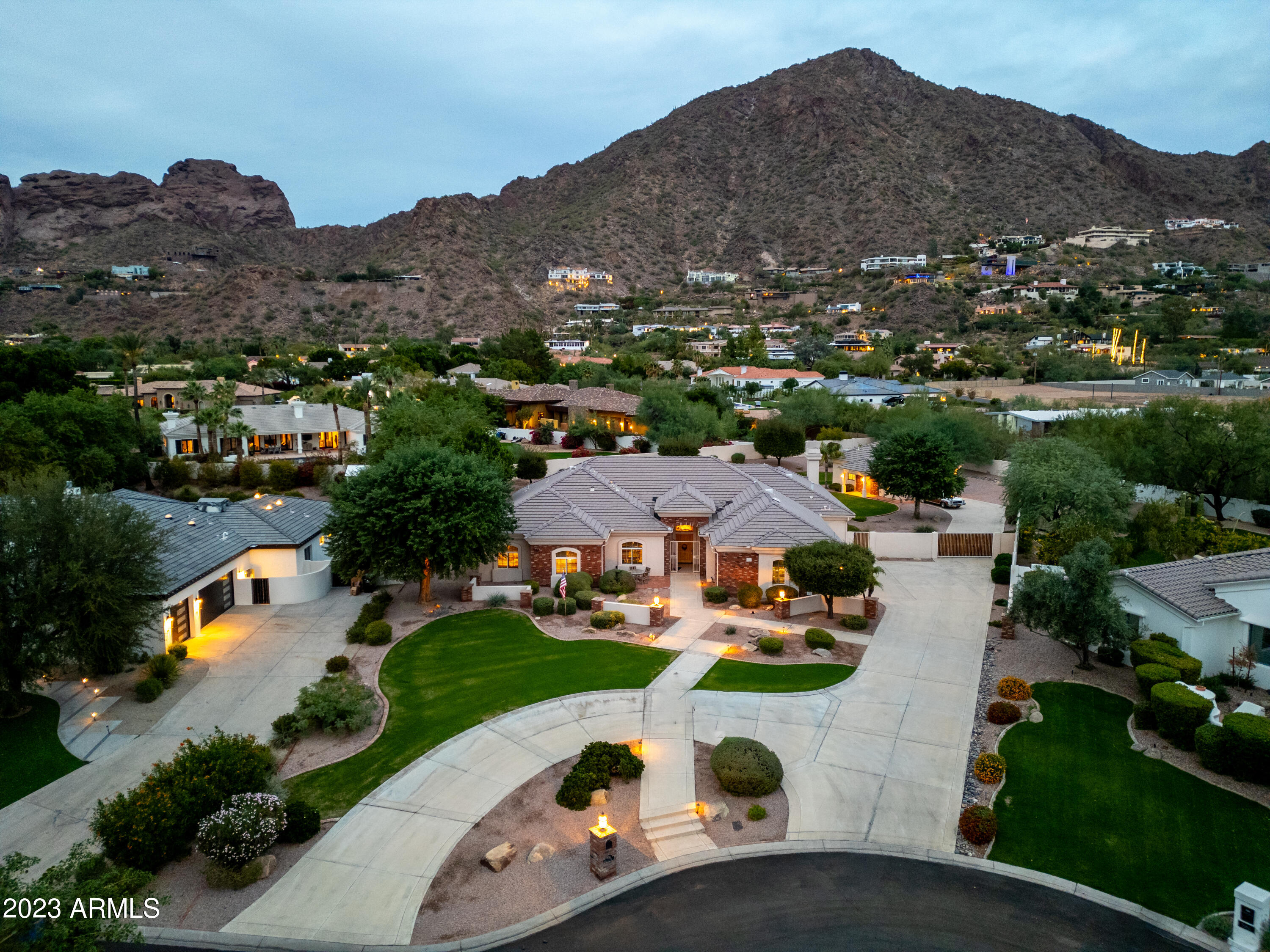 If you're looking for full on  Camelback Mountain views, a  fabulous home w/ a guest house, 37,000 sf plus lot in a cul-de-sac,  you have found it! 4 bedrooms, an office, 3 1/2 baths, 3 car garage, RV gate, pool, spa, guest house w/ kitchen, living area, bedroom & bathroom...... And did I mention the  Camelback Mountain views? Original owners meticulously maintained this home. Great floor plan for the busy family & perfect for the  entertainer. High ceilings throughout, so many windows allowing wonderful natural light. Beautifully landscaped in the front & back. Move right in & enjoy all the area has to offer: hiking, biking, walking, restaurants, The Global Ambassador, grocery, pet services, The Village Tennis & Health club, shopping, coffee shops etc.. Sky Harbor is 15 min away.