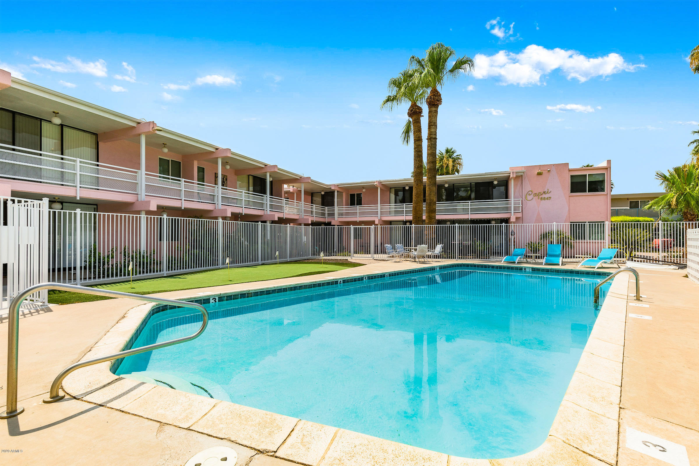 The Capri is a 13-unit, condo-mapped, garden-style apartment community located
in Scottsdale, Arizona. Constructed in 1959 with reinforced concrete block, the
Capri enjoys all the charm and flair of mid-century modern architecture. The units
have undergone modern renovations which include white shaker cabinets, solid
surface countertops, stainless-steel appliances, and wood plank vinyl flooring. 
There are (8) one-bedroom / one-bathroom units, (1) two-bedroom / one-bathroom
unit, and (4) two-bedroom / two-bathroom units, all individually metered for
electricity. Each unit enjoys walk-out balconies and patios overlooking the
community swimming pool and views of Camelback Mountain. Tenant amenities
also include a community putting green, patio with BBQ, and covered parking.
Capri is in excellent condition with newer air conditioners, roofs, asphalt, water
heaters, water lines, and dual pane windows. Located on a quiet cul-de-sac and walking distance from Old Town Scottsdale, Capri
offers a perfect location for both short-term visitors and traditional residents. Capri
also enjoys proximity to Scottsdale Fashion Square Mall and the Scottsdale
Waterfront. Both shopping centers offer a vast selection of high-end stores,
boutiques, restaurants, and cafes including Neiman Marcus, Macy's, Juicy Couture,
Gucci, P.F. Chang's, Kona Grill, Creamistry, and Press Coffee. Capri is centrally
located providing quick access to Phoenix Sky Harbor International Airport,
Downtown Phoenix, and Arizona State University in Tempe.