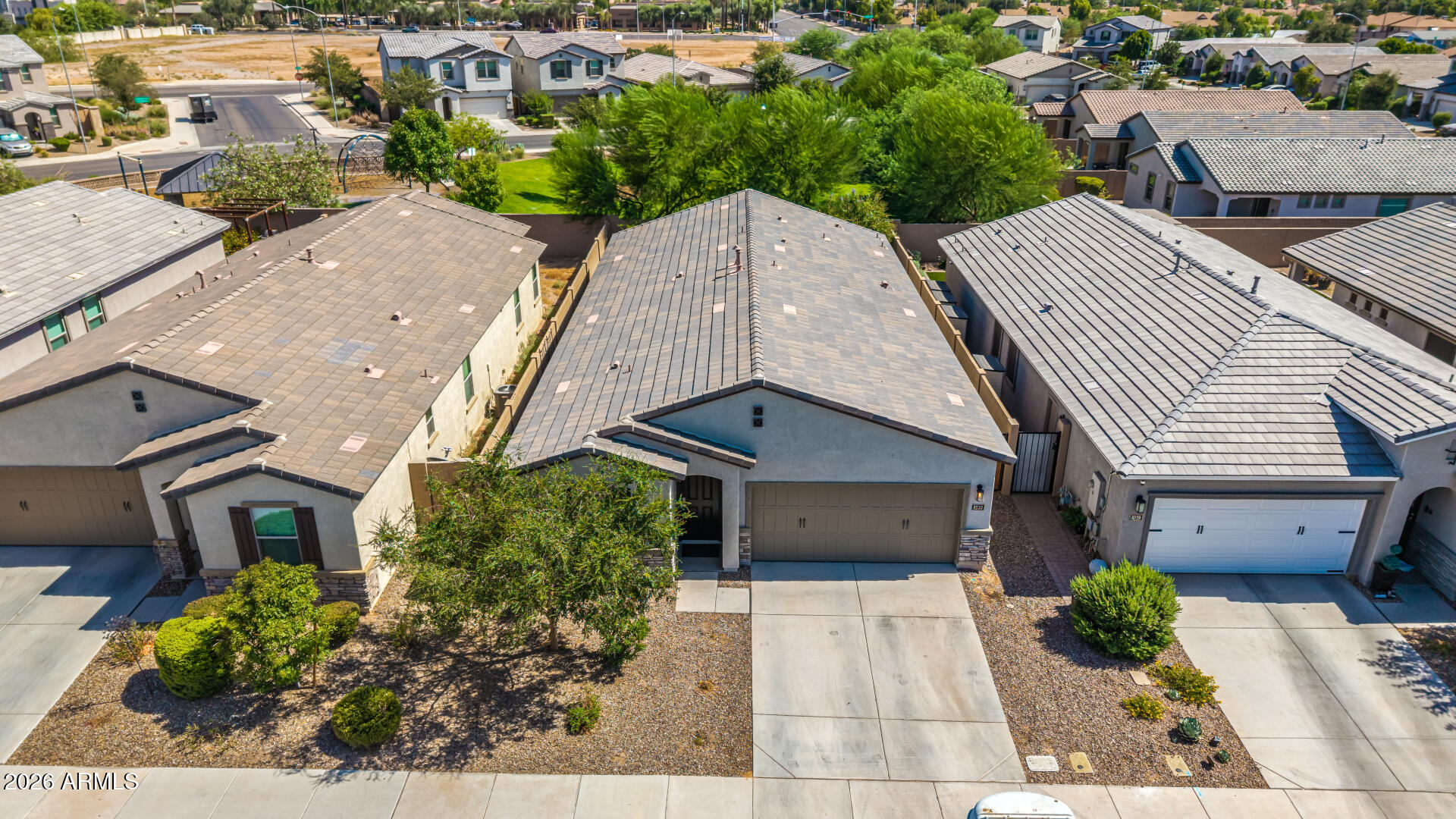 Built in 2020! Beautiful move-in ready home featuring 3 bedrooms +den, 2.5 baths with over $40K in upgrades! Split floor plan with light flooring, plantation shutters, & a spacious open layout perfect for entertaining. Gourmet kitchen showcases quartz countertops, extended dining room cabinets, custom lighting, & ample gathering space for family & friends. Retreat to the luxurious primary suite with custom closet organizers, floating raised vanities, & oversized walk-in shower. Enjoy the backyard oasis complete with pavers, softscape, & trellis with LED lighting. Garage features epoxy floors for a clean finished look. Community amenities include a heated pool, play lots, & dog park. Prime Mesa location with convenient access to the US 60 & Loop 202, shopping, dining, & more!