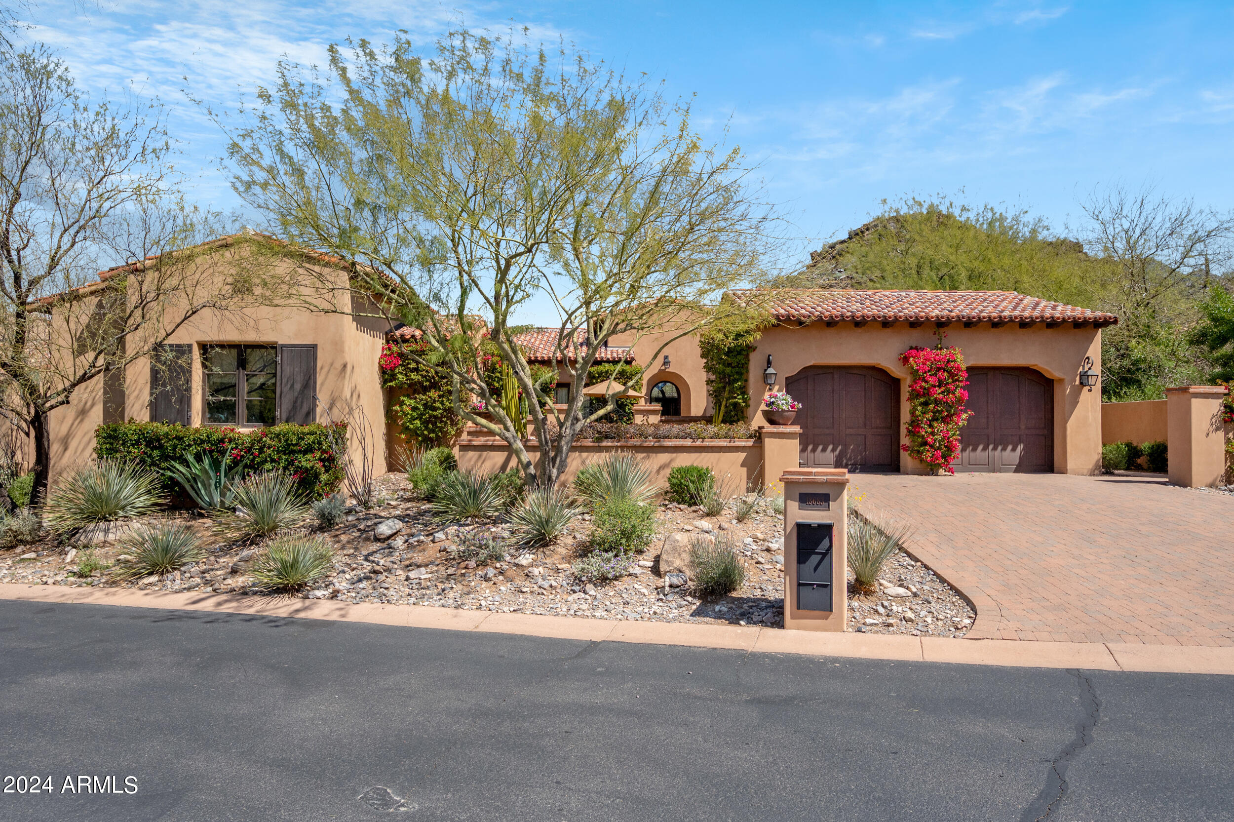 This charming single level home offers a unique opportunity to live in the desirable Horseshoe Canyon at Silverleaf. Located on a private lot with dramatic views and adjacent to the Silverleaf Club and Spa, this 3,337 sq. ft. home is the perfect retreat. Fully furnished and turnkey, this beautiful home features authentic Spanish architecture, a spacious open floor plan, an over sized detached guest house, private outdoor living spaces, and  large saltwater pool, and spa. Enjoy spectacular views both day and night of the private desert preserve and the McDowell Mountains.