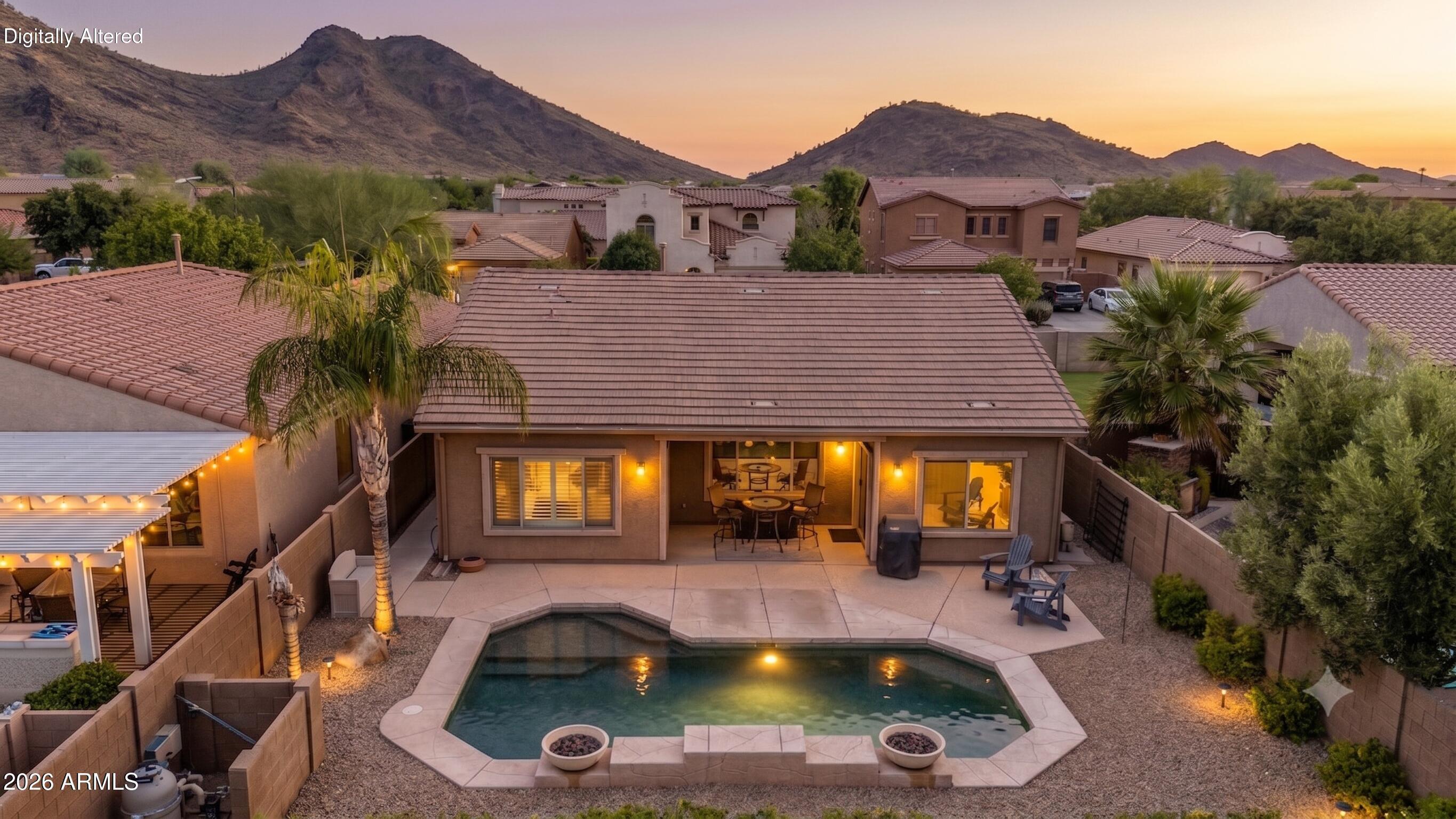 Your DREAM home with a POOL & MOUNTAIN VIEWS is here in Stetson Valley! No neighbors behind, as it backs to a common area, adding extra privacy. HVAC & ROOF replaced in 2023. HVAC has a transferrable warranty. This gorgeous residence offers 4 bedrooms, 2 baths, 2-car garage, manicured landscape, and great curb appeal w/stone accent details. The inviting interior showcases abundant natural light, a neutral palette, tall ceilings, and tile flooring w/carpet in all the right places. You'll love the desirable great room paired with pre-wired surround sound speakers! The main bedroom has patio access and an ensuite with two vanities, separate tub/shower, & a walk-in closet. Homes like this rarely come available in this location. Don't wait! The backyard oasis is the highlight, designed for ultimate relaxation and entertainment! Enjoy relaxing under the covered patio, or take a refreshing dip in the PebbleSheen pool w/sheer descent waterfall between two wok pots. What's not to like? Make this gem yours!