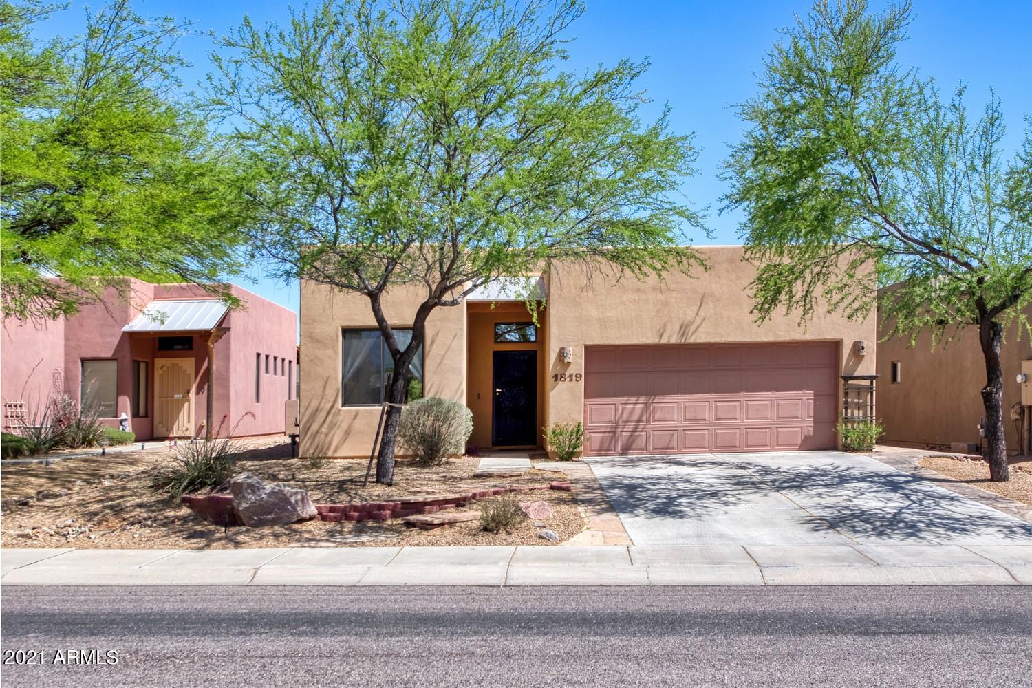 BACK ON THE MARKET AT NO FAULT TO THE SELLER!!!! Beautiful Move In Ready Home!!!! Located in a desirable neighborhood, Legends at Valiente! Notice the high ceilings when you entry the front door. Large open living room with a built in custom entertainment center. Large patio sliding door that leads out to your very own oasis, enjoy a flagstone patio, and sitting area and you also get a custom made waterfall and river bottom. Block wall has been stucco and mature tress have been planted. Back inside the home you will find large 16'' tile in all high traffic areas of the home. Large open kitchen which over looks the living room. Host a party and not miss out on the fun while cooking from the kitchen. Eat in kitchen area with two oversized windows. The home features 3 bedrooms and 2 bathrooms and an inside laundry room with custom cabinets. Hall bathroom is large and features a tub/shower combo with an oversized vanity and one sink. Two large bedrooms with very high ceilings. Both bedrooms have ceiling fans and they both have custom built closet organizers that are stunning. If you like your closet organized look no further. Master bedroom is large and it also has very high ceilings with a large window that overlooks your oasis backyard. In the walk in closet of the master bedroom you will find the Taj Mahal of closet organizers (pictures do not do it justice, you have to see it with your own eyes). In the master bedroom is where you will find the master bath. Inside the master bath you will find a tub/shower combo with a sliding glass door. An oversized vanity with dual sinks. This home is stunning and will not last long. Call me today for your private showing before it's SOLD.