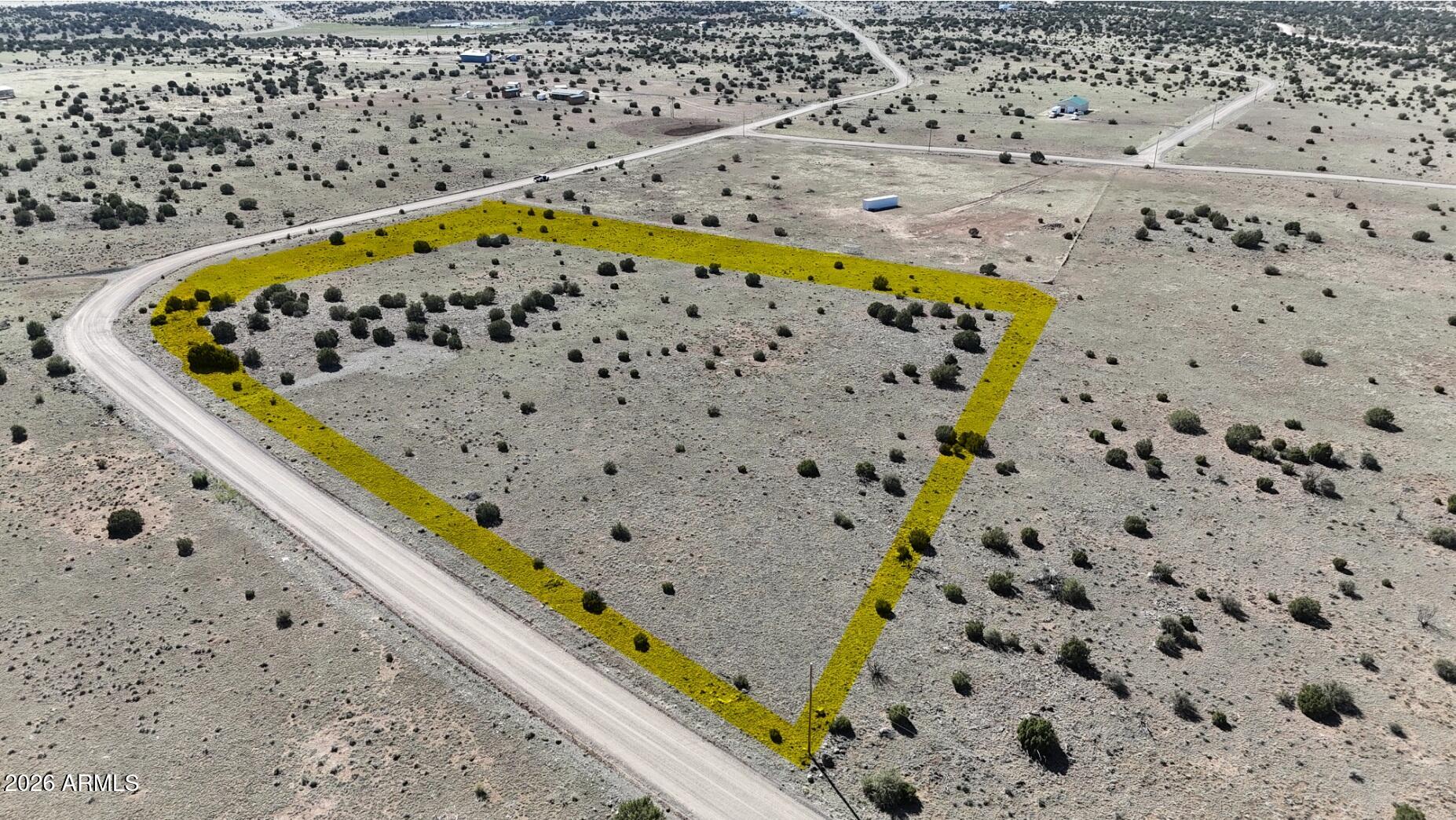 Expansive 7+ acre corner lot just off Highway 61 located in the Windsor Valley Ranch subdivision, featuring juniper-covered terrain and natural high desert vegetation. Ideal for a horse property or small ranch setup with room for livestock, RVs, or a custom or manufactured home. Enjoy cooler temperatures at over 6,000 ft elevation and peaceful open space. Gravel road access and electricity at the lot lines add convenience. Presently zoned A-General for flexible rural use. Approx. 30 minutes from Show Low's amenities. Buyer to verify all pertinent information. Drone video provided to showcase the beauty of this lot. Don't miss out on this amazing opportunity to secure your piece of Arizona land!