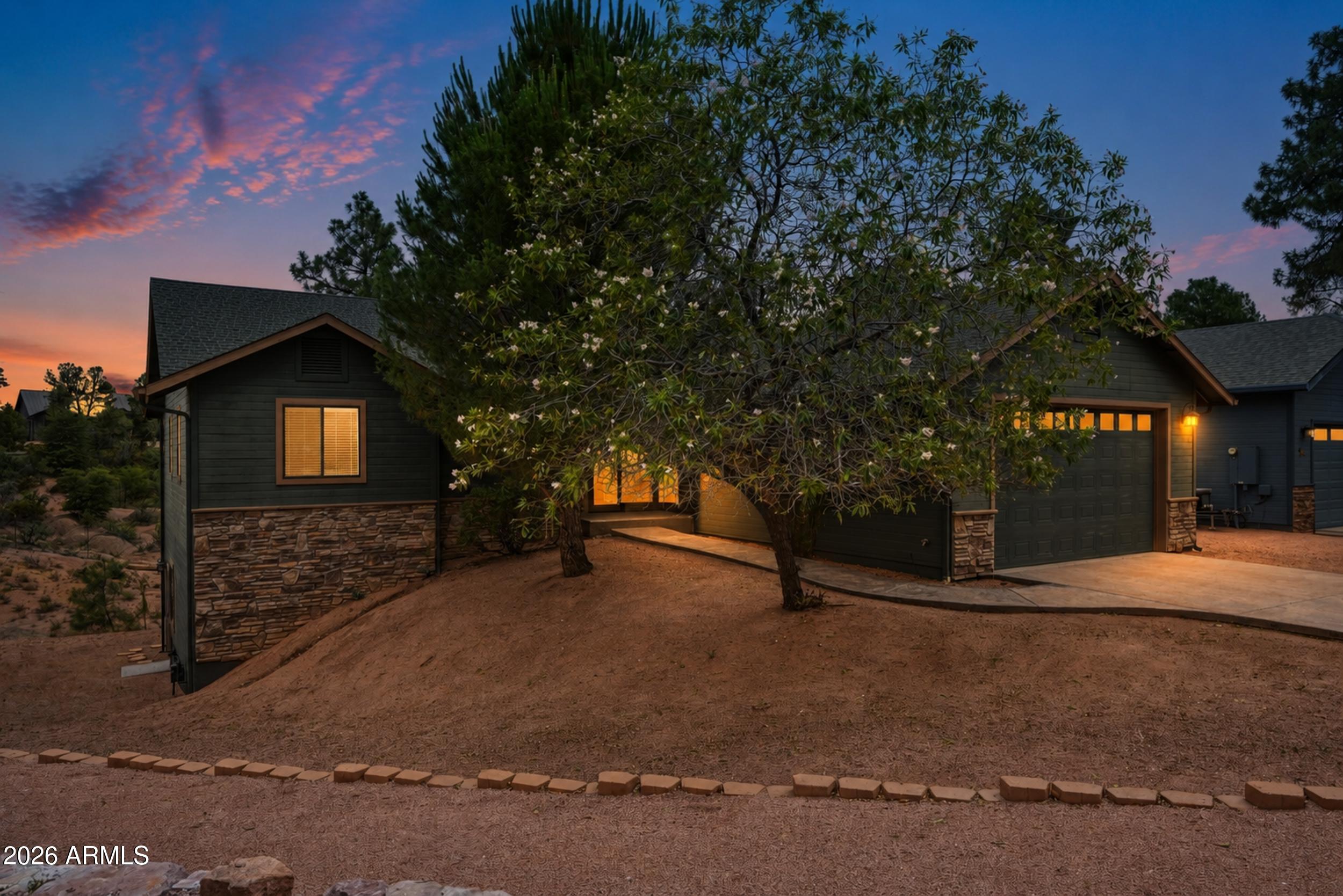 Mountain Serenity Meets Modern Comfort in Payson! Welcome to Ridgeway Lane, a beautiful mountain escape offering the perfect blend of privacy, space, and Rim Country charm. This beautifully designed 3-bedroom, 2-bathroom home features a bright and airy open layout, complete with a split-bedroom floor plan for optimal privacy. The spacious kitchen boasts elegant granite countertops, a gas range, and a built-in microwave--making it a chef's delight. Step outside onto the expansive covered back deck to experience the true essence of Payson living. Nestled on a generous 0.40-acre lot surrounded by majestic tall trees, the backyard offers a private sanctuary with stunning pine tree views, perfect for morning coffee or evening gatherings. Additional highlights include an oversized garage, extra storage/workshop space in the basement, and ample room to park your RV and outdoor toys. Don't miss this opportunity to own your slice of Arizona's high country!