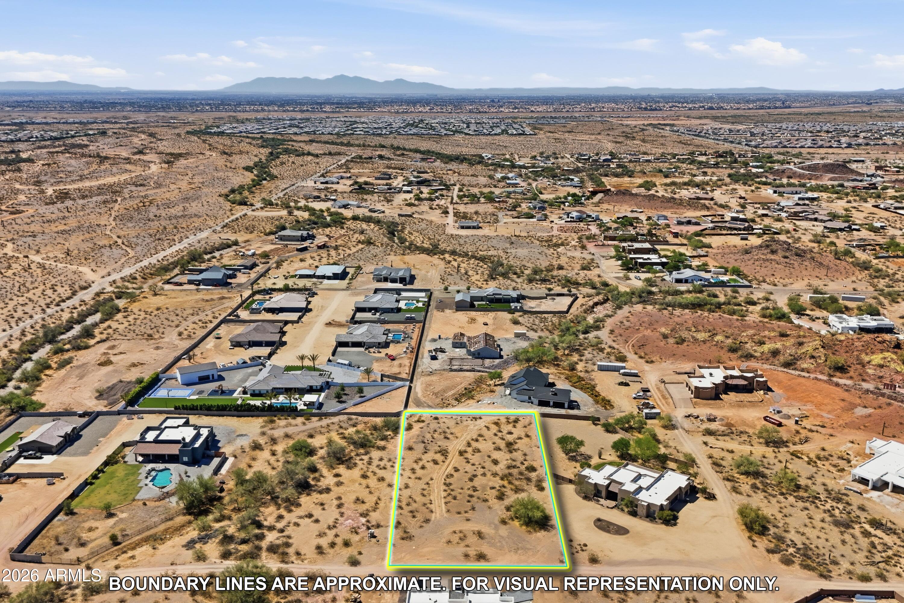 Panoramic mountain views and endless potential await on this 1.249-acre residential homesite, surrounded by numerous luxury new builds in a rapidly growing Northwest Valley location. Create a custom estate tailored to your vision with room for expansive indoor-outdoor living, recreational amenities, and more. NO HOA offers added flexibility and freedom. Ideally positioned just off Dynamite Blvd with convenient access to Loop 303 and US-60, providing connectivity across the Valley and beyond. Enjoy proximity to golf, hiking and outdoor recreation, including nearby golf courses at Trilogy at Vistancia and surrounding area amenities, along with shopping, dining, and everyday conveniences just minutes away. Professional photography coming soon!

***Google Maps: 33°44'13.7''N 112°22'16.0''W***