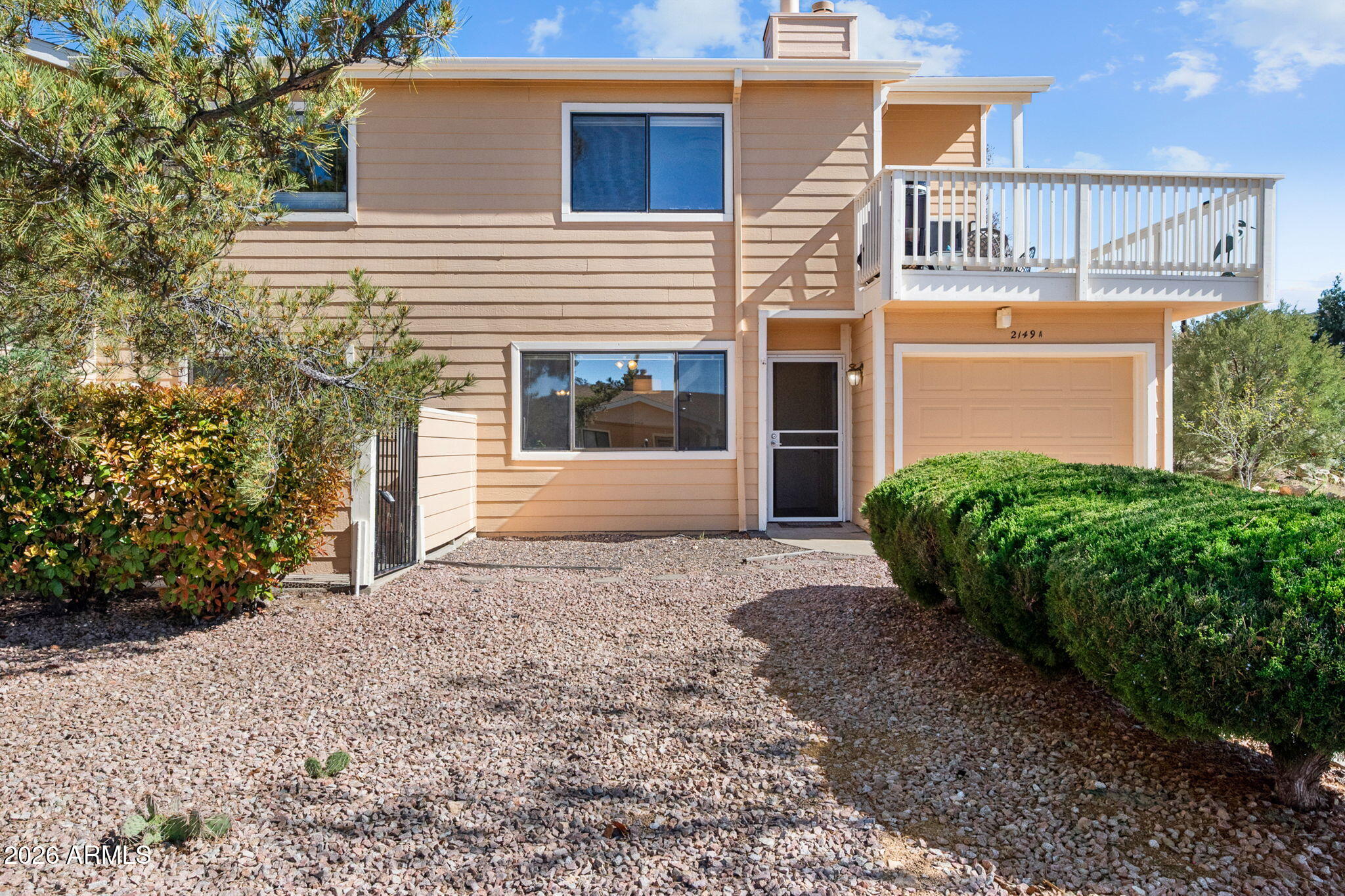 Enjoy easy, single-level living in COOL Prescott. Get out of the heat and into this move-in ready condo in a popular and convenient location! Thoughtfully updated, features new CORK flooring, fresh paint, granite countertops, newer stainless appliances, and updated cabinetry. The spacious kitchen has a lot of cabinet storage, counter space and a large dining area- perfect for everyday living or hosting friends. Enjoy the bright living room, relax by the cozy fireplace or unwind on one of two private patios. With a level-entry layout, attached garage, generous storage, and oversized closets, in-unit full-sized stackable washer and dryer, this home offers comfort and convenience. Located just minutes from shopping, medical, schools and trails. A rare opportunity you don't want to miss.