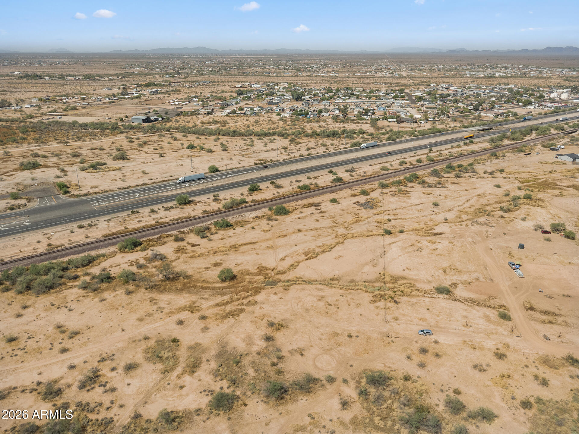 Endless possibilities await on this prime piece of land! This 2.625-acre parcel of flat, usable land offers the perfect opportunity to bring your vision to life offering accessibility with wide-open potential. Zoning allows for a variety of uses including a single-family home, manufactured home, horses and livestock, as well as detached structures such as barns, garages, and more - giving you the flexibility to create exactly what you envision. A private well is required, and connection to nearby power lines is available for added convenience. Whether you're looking to build your dream home, create a farm, develop an equestrian property, or secure a smart investment, this versatile lot is ready for it all. With generous size, convenient location, and limitless potential!