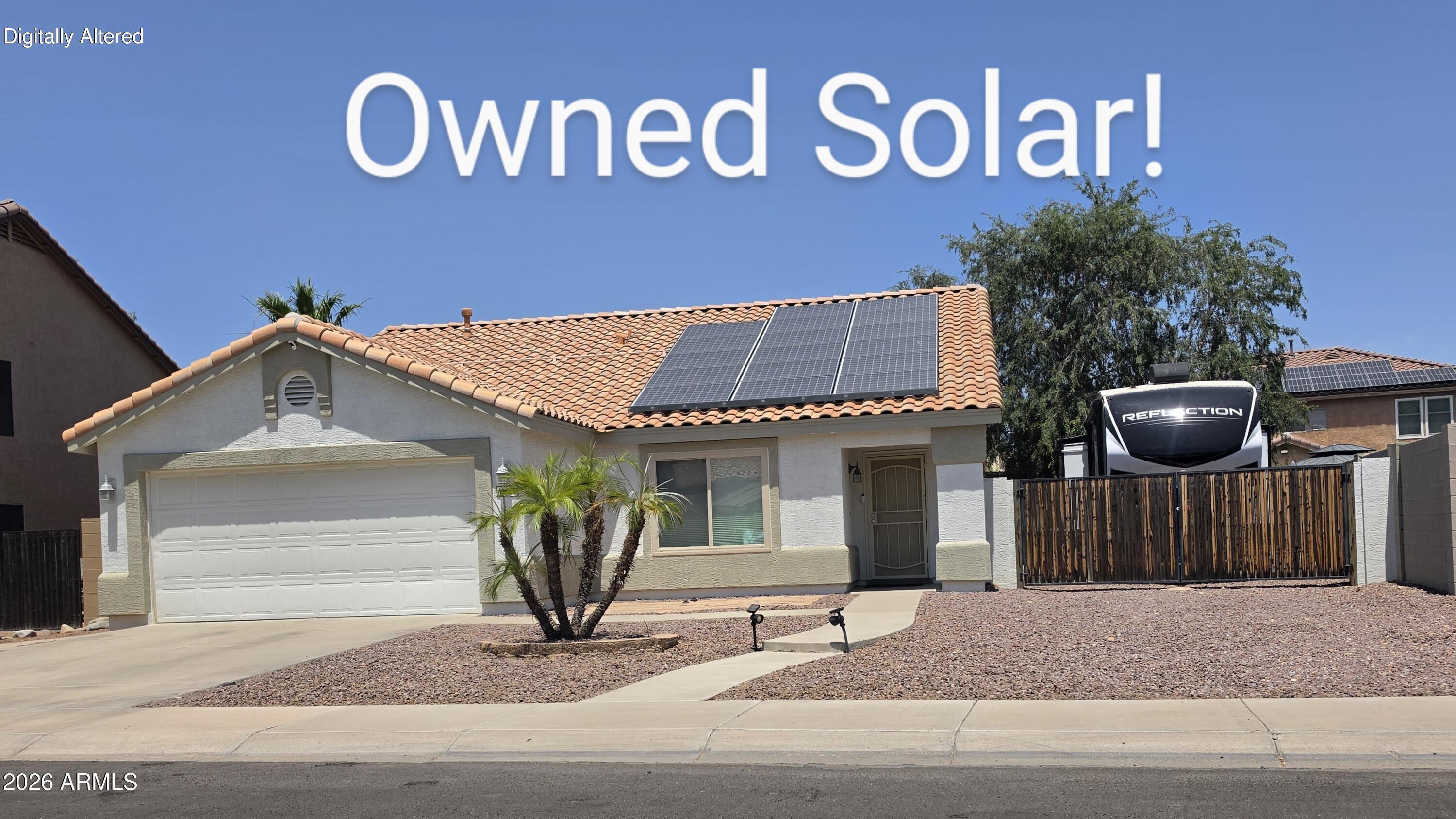 No HOA! This well-maintained 3-bedroom, 2-bath home features owned solar for low electric bills, a large RV gate, and an oversized north/south exposure lot with room for boats, trailers, and toys. Updated kitchen includes granite counters and stainless steel appliances. Newer vinyl frame windows with Low-E glass and A/C updated in 2019 add energy efficiency. The spacious primary bath has been beautifully remodeled with new cabinetry and a custom shower. Conveniently located close to schools, parks, restaurants, shopping, and easy access to the 303 freeway.