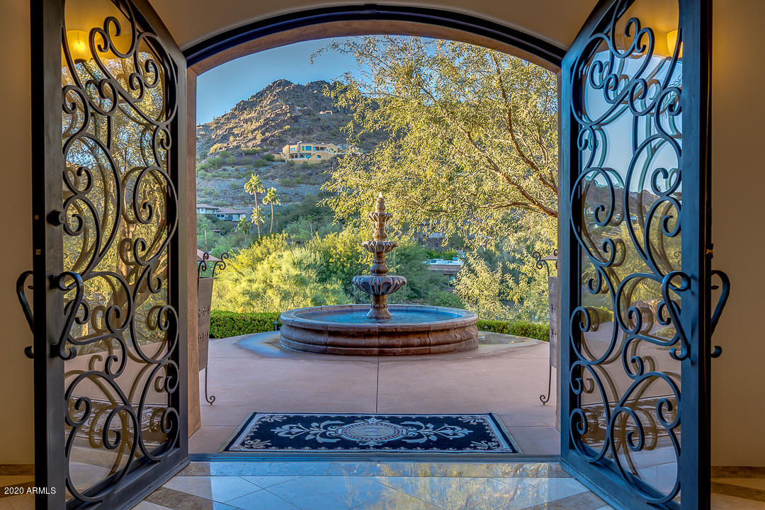Ultra Private Exclusive Hillside Estate!  Breathtaking Mountain Views from Every Window!  This Amazing Single Story Split Floorplan Smart Home features Chef's Dream Kitchen, Viking Appliances, Huge Pantry,  Breakfast Room, Cozy Family Room, Formal Dining Room, Stunning Living Room.  Massive Master Suite, Gas Fireplace, Private Gym, Dual Closets, Enormous Spa-Like Bathroom. 2 Additional Bedrooms are En-Suite w/Walk-In Closets. Telescopic Doors leading to a Mountain Wall Backdrop to a Lush Private Backyard Resort with the Finest in Indoor/Outdoor Living, Heated Pool, Cascading Waterfall, Built-In BBQ, Remote Controlled Shades & Lush Landscape!  Detached Guest House features Kitchen, 1 Bedroom, Fireplace, Huge Living Area. 3 Car Garage w/800 Sq. Ft Attic Storage Space.  Complete Dream Home!