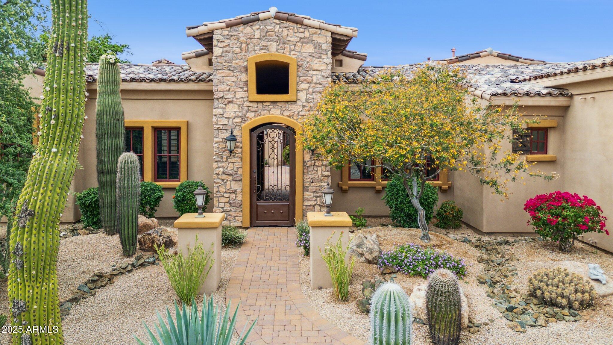Reduced $300k  Priced to SELL! In North Scottsdale's Prestigious Gated Community of Los Gatos in the heart of Pinnacle Peak. Voted Best Home on Pinnacle Peak Luxury Tour Set on a sprawling private 1.14 acre cul-de-sac, this home boasts 5289 sq. ft. of well thought out living space. This 5 Bedroom/5 Bathroom Open Floor plan with High Ceilings and Expansive Walls of Glass bringing the outside in, features Top Tier finishes Throughout. You will love the newly installed lighting throughout the home adding ambiance to all the natural light. Recently updated Granite Counters and Backsplash in the Chefs Kitchen with top appliances including gas cooking and huge island with plenty of seating. This modern, light and bright home is located well away from traffic in the back of the subdivision More The oversized 4 car side entry garage with a wall of custom built in cabinets and work bench will please any car enthusiast, add to that plenty of parking in the spacious driveway. RV gate to pull thru a boat. Close to top restaurants, shopping, churches, hiking trails and mountain biking. Available fully furnished! Turnkey property.