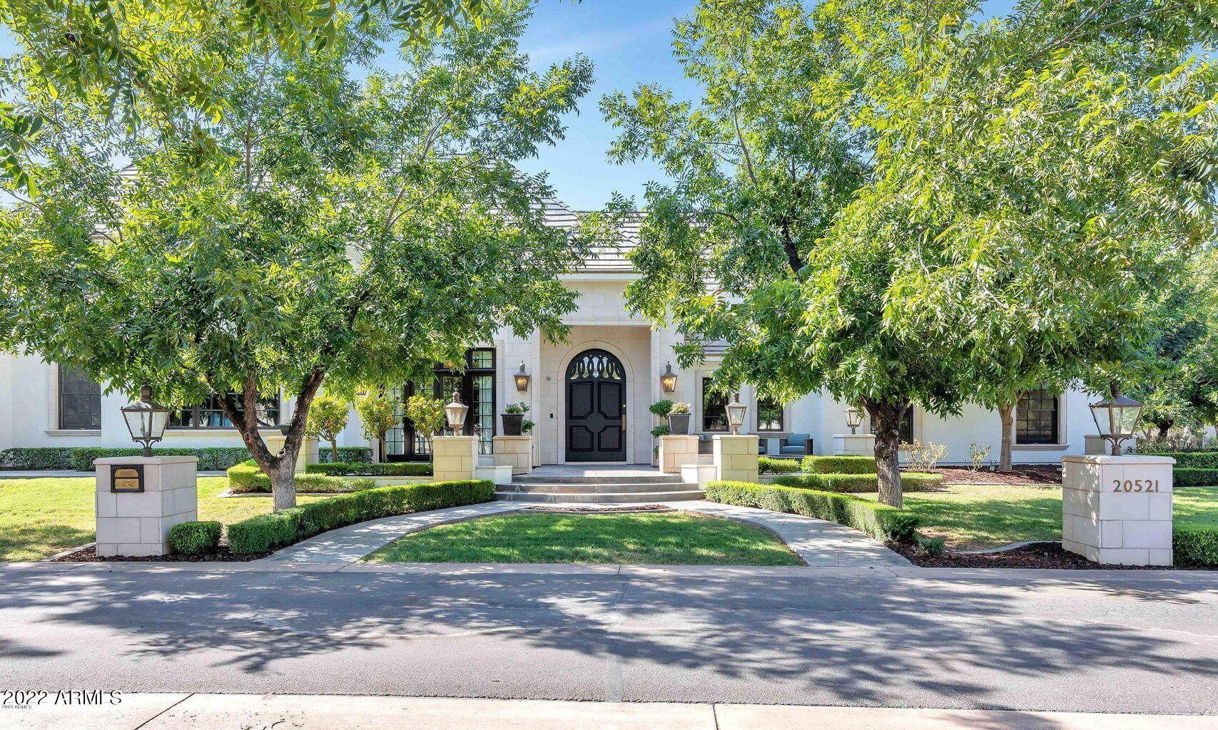 STUNNING ESTATE IN THE PECANS!  This modern French chateau was designed by Pinnacle Conceptions and built by E&A Custom Homes. This nearly 7,000 square foot home is sophisticated and glamorous. This home features an amazing kitchen with custom cabinet, marble counter-tops, high-end appliances, endless millwork throughout , wide plank wood flooring, updated lighting, 5 bedrooms have ensuite bathrooms with designer selected finishes, attached mother-in-law suite,  bonus flex-room for game room and/or media room and much much more. The back yard is perfect for entertaining as it boosts an incredible Pebble Tech Pool with custom slide and raised hot tub flowing into the pool, Built-in BBQ, endless synthetic grass areas with Pecan trees to embrace the back yard. This will sell fast!