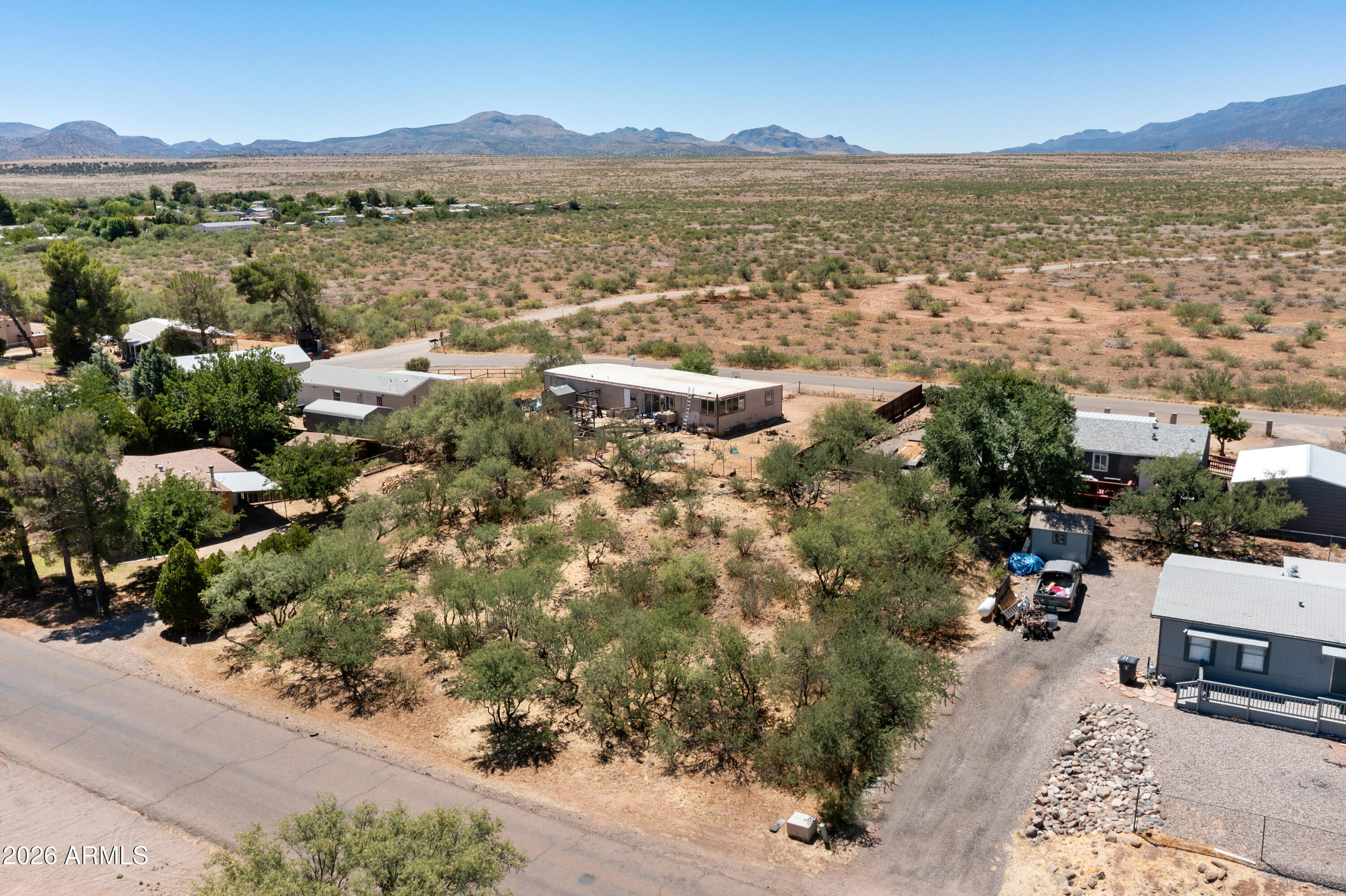 Fantastic .28 of an acre, zoned R1-12, with water and electric located close, would need a septic tank.  Available home/shop next door, .55 of an acre, listing #7049907 for separate purchase.