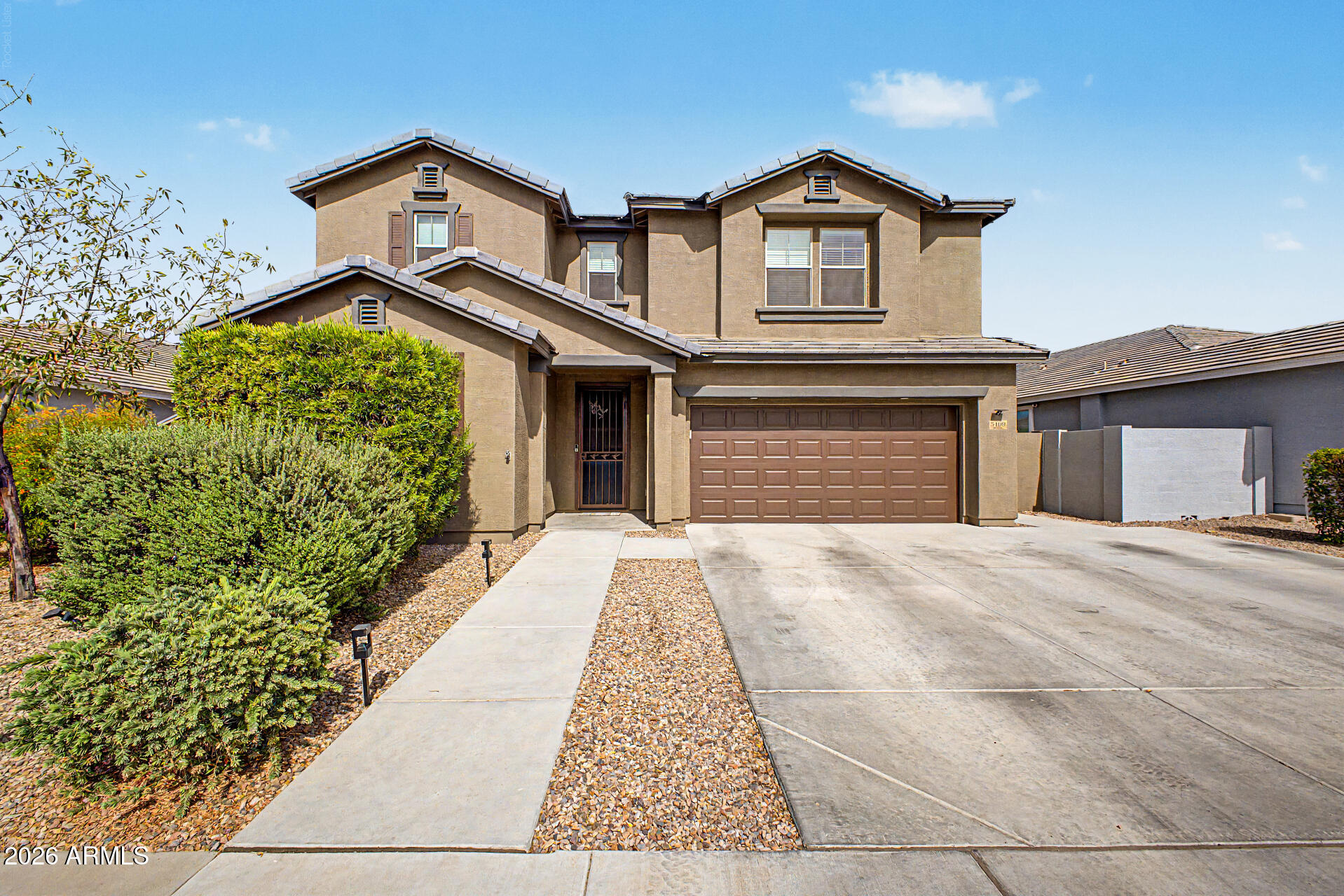 Check out this Beautiful 4 bedroom, 3 bath + Loft and 2 car garage in the gated community of Lehi Crossing. Wow!  Huge master with an barn door and an amazing closet. The resort backyard complete with a baja shelf and water feature is where you will be spending some of your greatest Arizona evenings. Open floorplan with great room and a guest bath and bedroom room on first floor. Check out the under stairs storage, 30x10 covered patio and 8x8 shed on the side yard. Lots of storage in this home! extra storage. New paint inside and out. Ready to move in. All it needs is you!