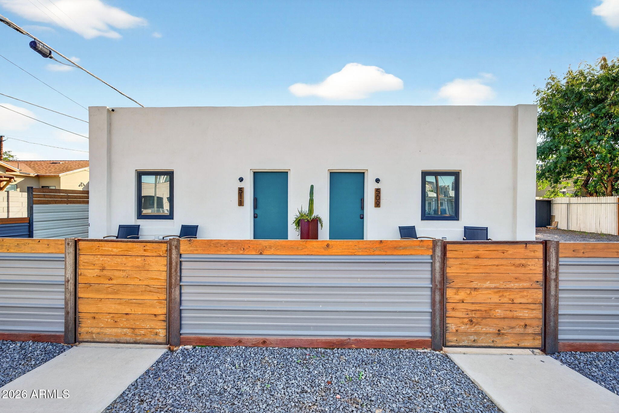 Welcome to 509 N 11th St, a thoughtfully updated two-unit residence located within a historic district, offering flexibility and an elevated urban lifestyle in central Phoenix. Unit 509 and Unit 511 each feature private entrances, bright open living spaces, modern kitchens and bathrooms, and well-proportioned bedrooms with flexible areas ideal for dining or working from home. Enjoy morning coffee on the front patio, relax in the rear yard, and appreciate exterior storage for added convenience. Just minutes from downtown Phoenix, local dining, arts districts, and commuter routes, this move-in-ready property blends historic character with modern comfort and everyday livability.