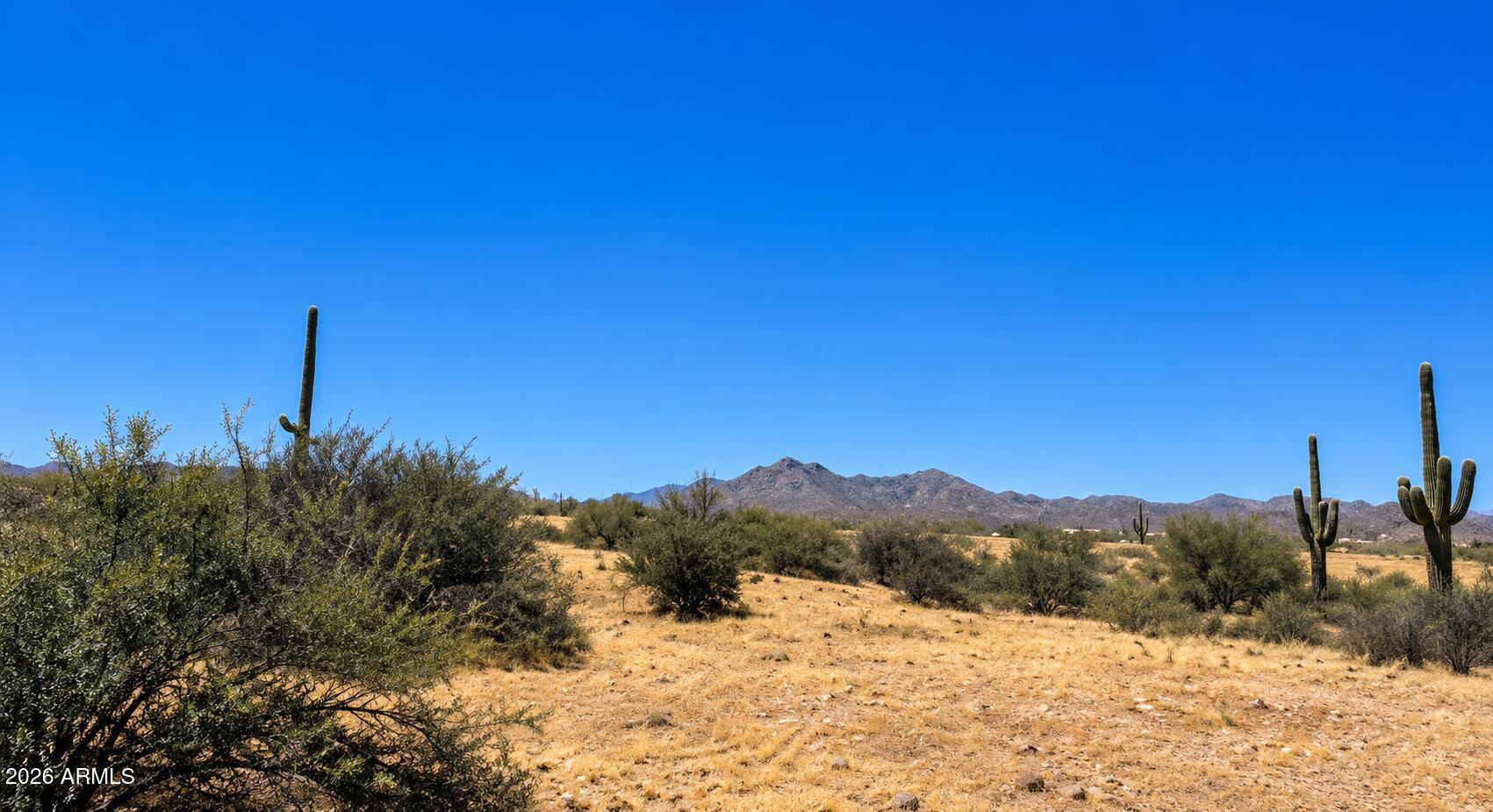 Sceninc 1.24 acre dream home building lot in coveted North Scottsdale Zip Code 85262. Beautiful North Scottsdale desert retreat in lush desert setting w/exceptional privacy and sweeping mountain views and clear blue sky. 2,000+ Ft Elevation provides cooler temperatures, crisp morning air, clear, cool, starry nights, with breathtaking Arizona sunrises and sunsets. Miles of hiking, biking and horseback riding trails; endless miles of ATV off-road adventure in the 3.5 million acre Tonto National Forest.

Seller purchased this vacant lot quite some time ago and has limited details; Buyer is responsible to perform research and due diligence, in all aspects. The property is being conveyed in its present physical condition.